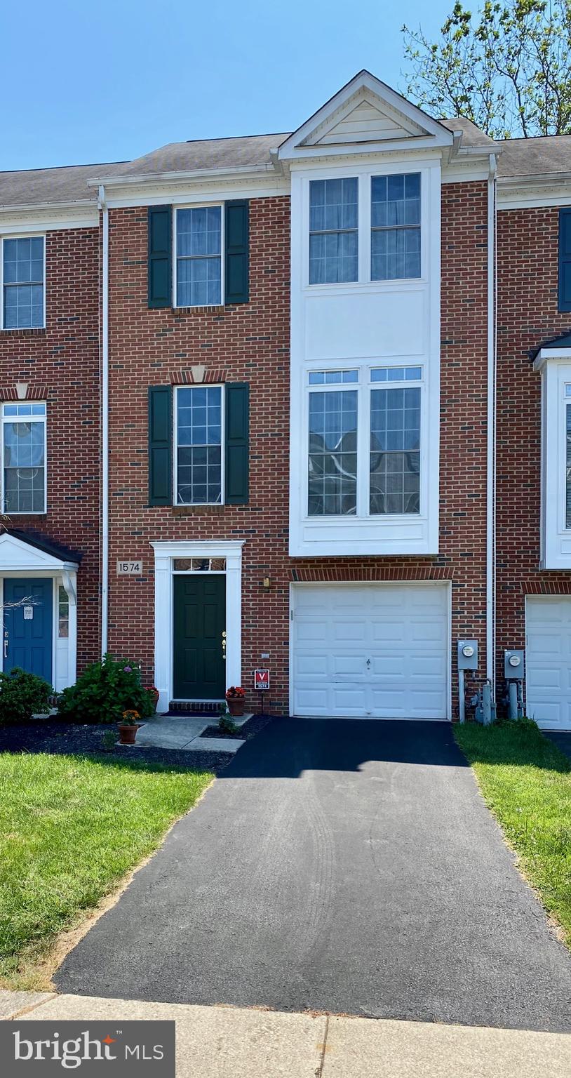 Beautiful 3 Level Townhome in "The Crofton Triangle" in quiet community. One of the largest models in the neighborhood with a 3 level bump-out. Great Schools with the addition of the brand new Crofton High School. Available membership to Crofton Swim & Tennis Club. Walk in bottom level to Open foyer and family room with possible bedroom and bathroom rough-in. Walk upstairs to open design living room, dining room, large kitchen, sitting area, gas fireplace and Sunroom. Hardwood floors in kitchen and sunroom. New stainless steel refrigerator with water and ice dispenser. Upgraded carpeting and padding throughout. Upstairs find 3 bedrooms, large master bedroom with cathedral ceiling, walk-in closet and large garden bathroom (above sunroom) with soaking tub, walk-in shower and dual vanities. 2 level boxed bay windows, attached garage, AC unit was replaced 2 years ago, fenced backyard backing up to trees/woods.