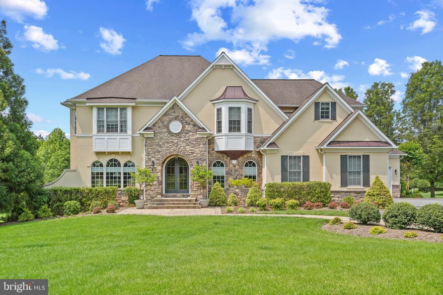 This stunning French Country-style chateau, a single-family home situated on 1.06 acres in Western Howard County, offers 4 bedrooms, 4.5 bathrooms, and a convenient 3-car garage.
The main level features a gourmet kitchen complete with a large island, a 6-burner stove, a warming drawer, and a Sub-Zero refrigerator. You'll also find a practical mudroom with built-ins, an expansive laundry room, a living room, a dining room, and a family room highlighted by a fireplace.
Upstairs, the primary bedroom serves as a true retreat with a gas fireplace and two walk-in closets, along with a primary bathroom that includes a luxurious towel warming drawer. Three additional generously sized bedrooms and two more full bathrooms complete the upper level.
The fully finished basement expands the living space considerably, offering a large office, a comfortable sitting room, a file/storage room, and a fantastic full bar equipped with a beverage refrigerator, dishwasher, and microwave, as well as another full bathroom. This home has been immaculately maintained and boasts a convenient location with easy access to major routes and shopping.