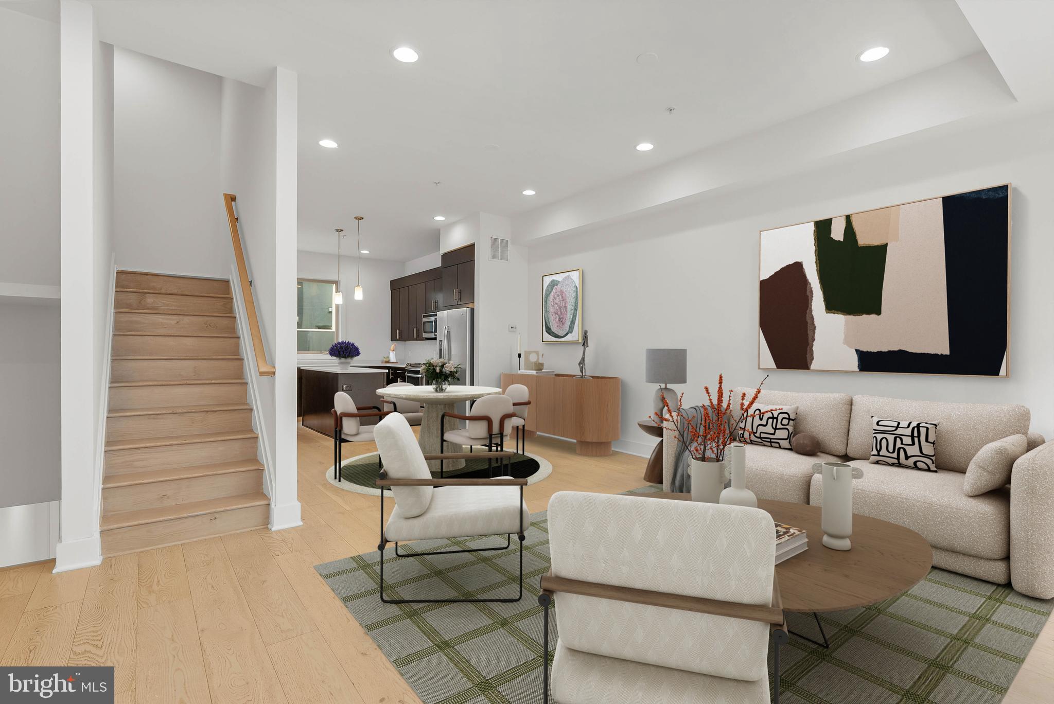 Stunning Northern Liberties home with garage parking and a private roof deck! This spacious 3 bedroom, 3 bath residence offers the perfect blend of comfort, space, and upscale finishes in one of Philadelphia’s most vibrant neighborhoods. Inside, you'll find wide plank hardwood floors, recessed lighting, excellent ceiling height, and bright living spaces with generous room sizes. The gourmet kitchen is equipped with granite countertops, stainless steel appliances, tile backsplash, and ample cabinetry—ideal for both daily living and entertaining. The full-floor primary suite offers a serene retreat with a large sleeping area, abundant closet space, and a spa-like bathroom featuring a floating vanity and a gorgeous travertine tile shower with seamless glass doors. All three bathrooms are beautifully tiled with a sleek, modern design. Located just steps from the Delaware River waterfront, great restaurants, boutiques, and with easy access to public transit, this home is a must-see in one of Center City’s most desirable neighborhoods. Taxes and square footage are the responsibility of the buyer to have verified independently. Some photos are AI enhanced.