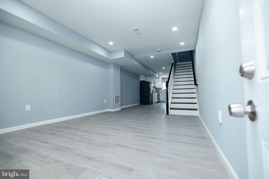 Welcome to your completely renovated home ! This exquisite 3-bedroom, 2-full bath haven invites you with a picturesque front porch . Step inside to discover the updated kitchen , a. Luxurious vinyl flooring graces the main level, complemented by freshly painted interiors, creating a seamless blend of style and comfort. Whether it's a quick meal at the eat-in island or a cozy dinner in the dining area, this space accommodates all. The upper Level  2 bedroom ,  one full bath and Laundry room. The finished lower level is tailored for relaxation and entertainment, complete with a third bedroom and another full bath.  While quick access to commuter routes and downtown amenities is just minutes from your doorstep. Don't miss the opportunity to make this your dream home!

Hide