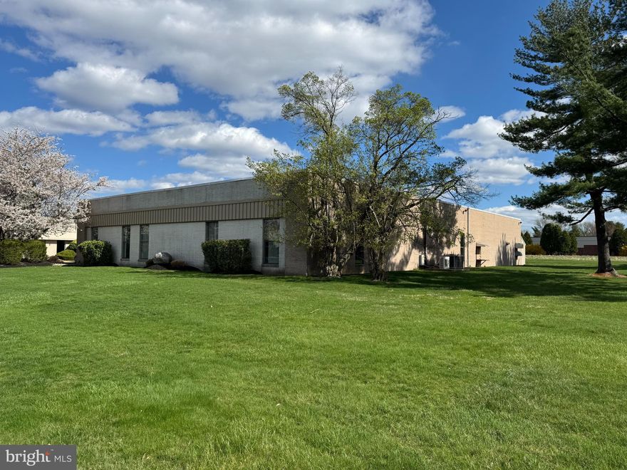 10,400sf Flex Warehouse building in the desirable Newtown Business Commons located on a highly visible corner 2.21 acre lot zoned light industrial; approx 2000sf of office space and 8400sf of warehouse with one drive in door and one tailgate door; 16' floor to ceiling beam in warehouse; 25' x 40' column spacing; 480V, 3 phase electric; natural gas heating and central air;  4 bathrooms;  two 8' x 8' tailgate doors - one of them has a drive in ramp; expansion potential; Newtown Township is open to many new potential uses in the Business Commons (see recent Overlay District proposal); warehouse/flex space is difficult to find and especially hard to find in Newtown; convenient to I-295, Route 1 and the PA Turnpike as well as restaurants, shopping centers and Historic Newtown Borough