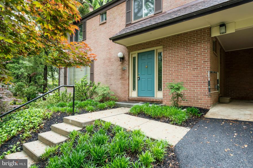 Spacious midcentury built home, with plenty of living space! Four bedrooms all upstairs, hall bath and private master bath. Master Bedroom has walk in closet and large attached sitting room that could be incredible dressing room or nursery! Living room with fireplace and family room /kitchen combo. Basement is enormous and has two walk outs. Large flat yard and three car parking at top of drive.