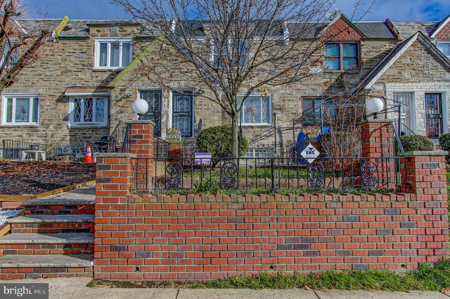 Come see this beautifully remodeled home with plenty of natural sunlight, nestled in the desirable Mt. Airy section of Philadelphia. This home's location is very convenient as it is situated near several shopping centers and has easy access to public transportation. Once inside you will enjoy the open concept living space that can be tailored to your liking. The kitchen has an island that comfortably seats four guests and is fully equipped with stainless steel appliances, quartz countertops and backsplash! Upstairs you find a Primary Bedroom with an exquisite primary bathroom and 3 closets which run the length of one wall! There are 2 ample size bedrooms with ceiling fans and the hallway bathroom is diagonally situated from the linen closet. The fully finished basement can be used as a family room or entertainment room. It offers a half bath, laundry area with a washer and dryer and an additional bonus room that can be used as an office, workout room or guest room. When you exit the laundry room you find private parking for an additional car and access to an additional storage area. What better way to start the new year than to make this house your home!