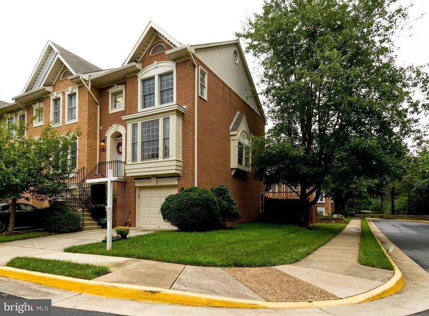 Meticulously maintained 3 level upgraded end unit former model townhouse. Move in condition.  Upgraded floors: wood, carpeting, LVT, & tile.  Baths have upgraded fixtures & floors.  Air conditioner system only 2 months NEW!  New hot water heater 8 months old.   Bedrooms: vaulted ceilings & roomy closets.  Master oversized tub & oversize shower   Freshly painted in soothing tones.  GREAT LOCATION!!