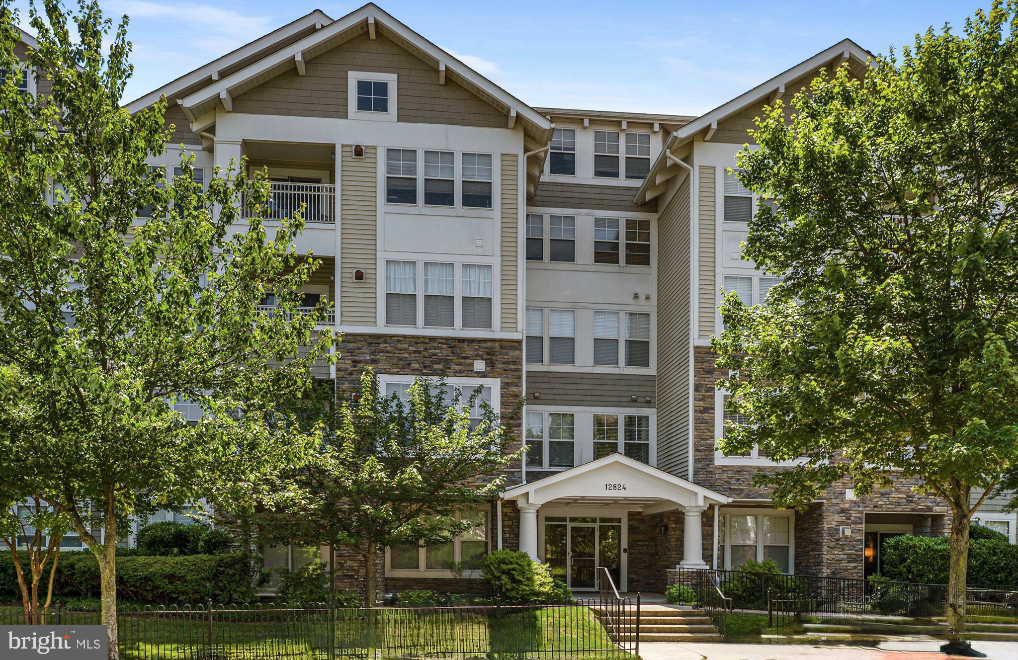 Did you see the price?! BEST VALUE in CLARKSBURG. This rare two-level, 3-bedroom, 3-full-bath condo with a private 1-car garage is tucked into the heart of amenity-rich Clarksburg Town Center. BRAND NEW APPLIANCES, fresh paint and new carpet throughout, this home offers a bright and welcoming atmosphere, enhanced by vaulted ceilings and abundant natural light. ELEVATOR BUILDING.
The main level features a spacious great room with a cozy fireplace, a formal dining room with detailed trim, and a separate den or flex space perfect for a home office or reading nook. The eat-in kitchen is outfitted with classic white cabinetry, gas cooking, and ample counter space. Brand new GE Profile stainless steel appliances have been purchased and are currently being installed, adding a sleek, modern touch to the space. A sunny breakfast area is framed by large windows and neighborhood views, making it a perfect spot to start your day.
Two bedrooms and two full baths are conveniently located on the entry level, including a spacious primary suite with an impressively large walk-in closet and a private bath offering a soaking tub and separate stall shower. Upstairs, a third bedroom and full bath provide an ideal setup for guests or a private workspace.
Additional highlights include plentiful parking, a private garage, and stunning views from the upper-level windows. Residents of Clarksburg Town Center enjoy access to community amenities such as a clubhouse, pool, fitness center, playgrounds, and walking trails—all just minutes from shopping, dining, and major commuter routes. WEIS MARKET grocery store approved to be built in community.