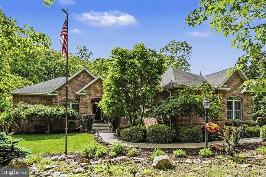 Welcome home to 1145 Kuhn Road, an intricately designed & immaculately kept home, nestled in the peaceful countryside of charming  Boiling Springs and perfectly situated close to schools in sought after Cumberland Valley School District.  This stunning property boasts over 4,800 finished square feet, located on a quiet road with picturesque views, while still being conveniently close to all local amenities. Enjoy the beauty of this private lot and the surrounding nature on your choice of a large upper deck or spacious lower level patio.
Step inside to discover the warm and inviting interior filled with natural light, an open concept lay-out with easy access between the kitchen & all living areas.  A true gourmet kitchen awaits you featuring custom cabinetry, stainless steel appliances, a double oven, spacious corian countertops with island, & plenty of storage space. This home boasts one-floor living with over 2,700 square feet on the main level, featuring a spacious primary bedroom, large walk-in closet, luxury primary bathroom, 2 additional bedrooms, & main level laundry room.  It also includes a formal dining room, cozy living room, & centrally located office.  Complete with gorgeous hardwood floors & a gas burning fireplace, this home is perfect for entertaining or simply relaxing with the family.
Head downstairs to a fully-finished lower level with over 1,900 square feet of additional living space, featuring a large recreation room, 1 additional bedroom, and 1 full bathroom, a large bonus room (could be used as bedroom/office/work-out room/craft room, etc) & a large separate storage area.
Truly a one-of-a-kind home.   Schedule your private tour today!