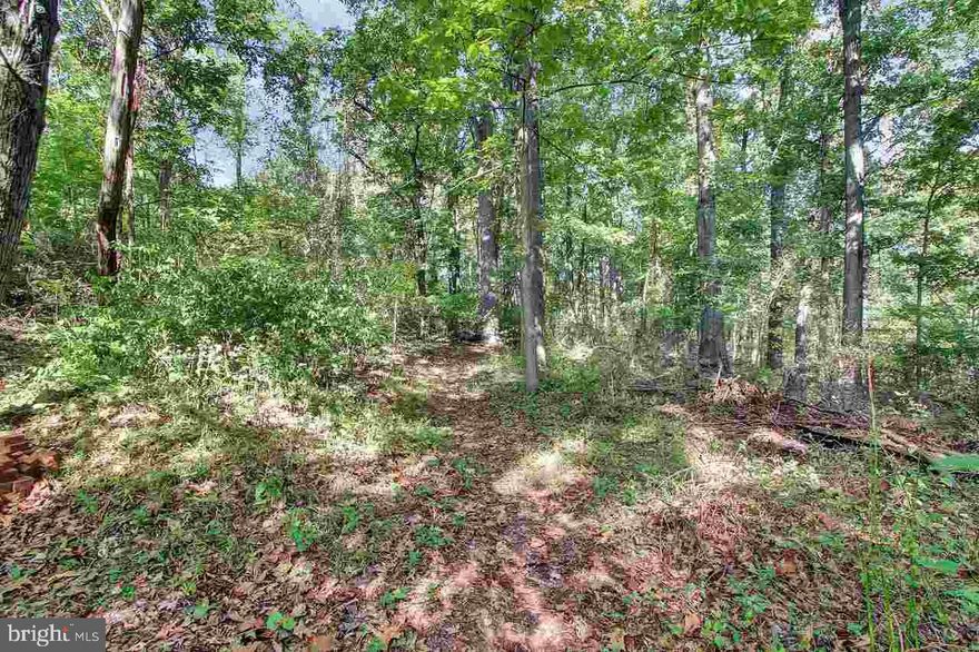Excellent wooded home site, located conveniently between Harrisburg and York. Great deer hunting! See associated docs for plot plan for adjacent home Lot 1(3.22 acres)  and another lot( #2)(3.32 acres)