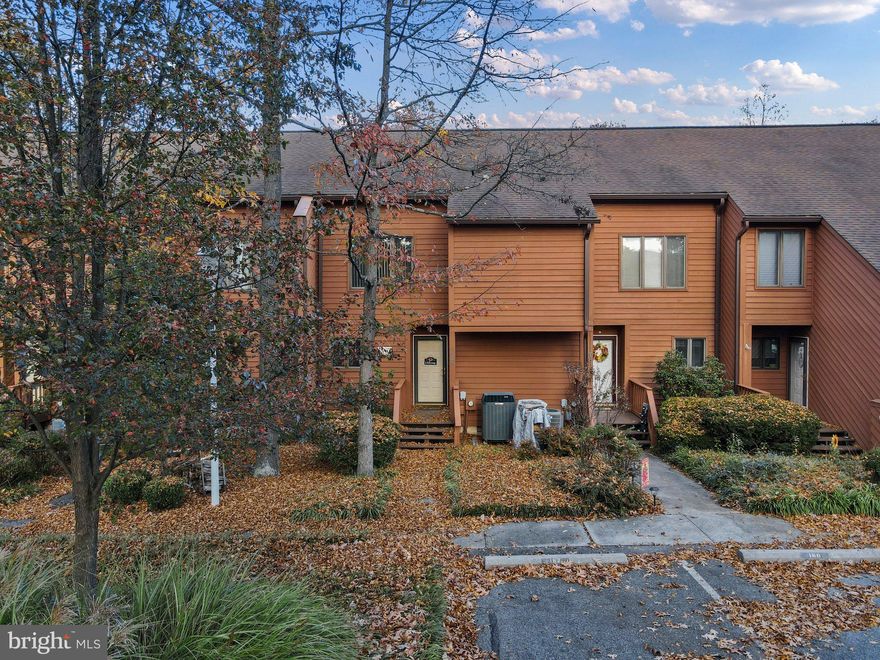 If you are looking for a home where you do not have to worry about lawn maintenance and exterior maintenance this is the property for you. Tomahawk Ridge Cluster Association takes care of most of the exterior maintenance and landscaping so you can enjoy all the amenities that The Woods has to offer. Beautiful well maintained two level own home located on the 17th Fairway of the Stony Lick Mid-length Golf Course. Decks off of the living room & owner's bedroom facing the fairway, perfect place for your morning coffee and enjoy the gorgeous outdoors. Cozy gas fireplace in the living room/dining room to enjoy on those chilly days. The upper level consists of two bedrooms with vaulted ceilings each with privates baths. The primary owner's suite has a sliding glass door to the private balcony with a gorgeous view of the fairway #17, skylight over the whirlpool tub & separate shower with glass doors and two large closets in the owner's suite. The laundry is located on the upper level with full size stack washer/dryer. With in walking distance to the outdoor pool, pro shop, Clubhouse Grille, and driving range. Trap door in outside storage area to access the crawl space. Class A membership available with a $3,150 initiation fee to The Woods Club. Come see this home soon!