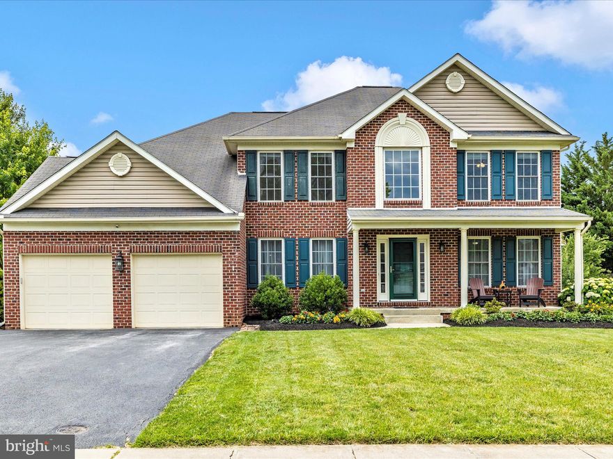 Gorgeous Brick Front Colonial in desired Deerfield community in Walkersville. Lovingly maintained by the original owners. Three finished levels with over 4200 sq ft of finished living space. Almost EVERYTHING in this property has been updated/renovated. Freshly painted throughout. New carpeting on upper and lower level. New vinyl plank flooring on main level. Renovated eat-in kitchen w/newer soft close cabinets, granite countertops, newer stainless appliances and built-in wine refrigerator. Kitchen opens to family room w/gas fireplace, lovely sunroom w/vaulted ceilings, and formal dining room. Very open floor plan.  Grand two story open foyer when you walk in the front door, staircase has been updated, additional room for office/den/formal living room/play room off the foyer.  Main level also includes Laundry Room and updated Powder Room.  Upper-level features primary bedroom suite w/large walk-in closet and renovated primary bath, 3 additional nice-sized bedrooms and hall bathroom. All bedrooms have overhead lights w/fans. Finished lower level includes brand new renovated half bath. (There is also a rough-in for a shower that can be added to bath if desired.) Sunroom walks out to stunning patio w/custom built stone fireplace and rear yard. Newer 10X15 Shed with electricity. Two car garage w/newer garage door openers. HVAC and hot water heater replaced 5 years ago.  All the work has been done on this home. Just move in and enjoy. Hot Tub conveys. Kitchen and Dining room tables are for sale if Buyer is interested.