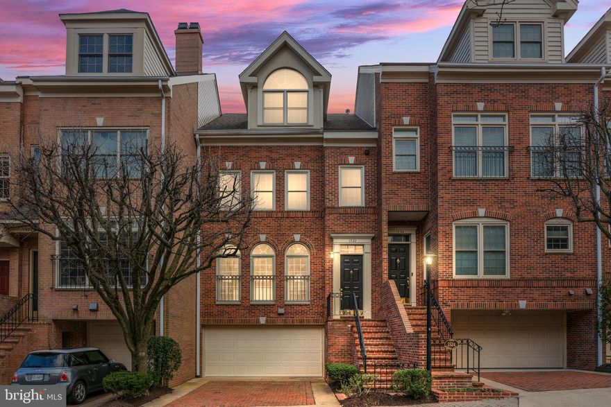 Welcome to this fully renovated luxury townhome only minutes from the Key Bridge. 4 stories, elegantly remodeled in 2022, to include refinished hardwood floors and fresh paint. Bright, large windows welcome you into the living room, open to the dining room with a new, modern light fixture and chair rail molding. The kitchen is remodeled with fresh white cabinets, stainless steel appliances, including an LG dishwasher, LG Smart InstaView refrigerator, LG gas range/stove with griddle. An oversized undermount sink, tile backsplash, and quartz countertops complete the clean, modern look. The kitchen is open to the sitting area with a gas log fireplace, stone hearth, and built-in bookshelves. The vast primary bedroom features 2 closets, including a walk-in. The primary en suite bathroom features dual vanities, a new tile floor, a soaking tub, and a custom tile and glass walk-in shower. An additional bedroom and full bathroom are located on this level. Continuing to the third level, you find 2 large bedrooms, more storage, and another full bathroom. The finished lower level includes a gas fireplace, full bathroom, and ample room for a playroom, game room, recreation room, or office. 2-car attached lower level garage.
Only a 6-minute walk to the Rosslyn Metro station and immediately located within all the restaurants, parks, and shopping Rosslyn has to offer. Only a 1-mile stroll across the bridge into Georgetown.. Owner/agent