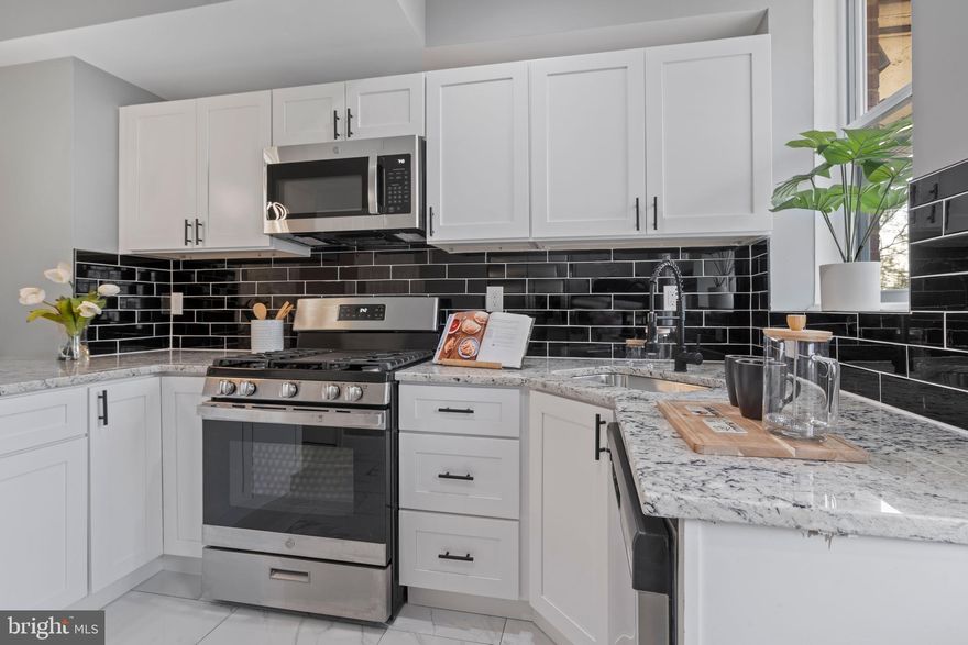 WELCOME HOME! Newly Renovated all brick home located in East Baltimore Midway. The interior of this home has been renovated from top to bottom. A perfectly charming 3 bedroom/ 3.5 bathroom home. This home is the best value. Step in and experience a large inviting open floor plan. The spacious kitchen features all new appliances. The living and dining room areas are perfect for gatherings and entertaining needs. The main level also features a half bath. Upstairs features 2 generously sized bedrooms and 2 full bathrooms. The basement is open with 1 bedroom and another full bathroom. The backyard is multi-functional including a deck. Don't let this house pass you by! If you've been looking for a newly renovated home at an incredibly affordable price- THIS ONE IS FOR YOU!