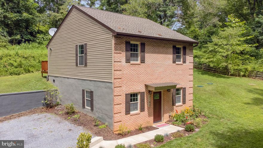 Recent price improvement! You won't want to miss out on this beautiful 3 bed/2 full bath colonial on a very private lot in White Hall! Everything in the house is less than 5 years old and it feels brand new. This house has a beautiful open layout, crown molding, 10ft ceilings on the main level and vaulted ceilings upstairs with high quality laminate flooring and fresh paint throughout. The kitchen has granite counter tops and stainless steel appliances.  The master bedroom has a built-in electric fireplace and a beautiful en-suite bathroom. The views from every window capture the private country feel of this house and the paved driveway has room for 5+ cars. Located 10 minutes from 83 in the Hereford School District. Come see this house before it is gone!