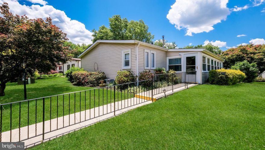 Fabulous 3 bed, 2 bath home offering 1,680 sqft of interior living space; one of the largest models available!  Features an enclosed front porch, spacious layout, remodeled bathrooms and a wood pellet stove in the living room for added warmth and charm!  An open layout for comfortable living in a great location! The Village of Neshaminy Falls is a 55+ Active Adult Community with a gorgeous newly rebuilt clubhouse featuring a library,  fitness room and game room. From the clubhouse walk out to the wrap around Veranda that overlooks the heated inground pool.  Many activities/clubs for your enjoyment including weekly shuttle bus to markets and so much more to offer. The monthly ground rent covers the community room, shuttle, sewer, trash, common area maintenance and snow remove of streets. Definitely put this one on your list!