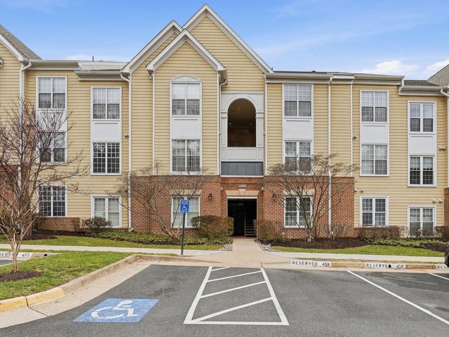 Welcome to this beautifully maintained 1-bedroom, 1-bath condo in the highly sought-after Worldgate Condominium in Herndon, VA.  Located on the second floor, this light-filled home features wide-plank LVP flooring and an open, inviting floor plan that is perfect for comfortable living and entertaining.

The spacious living and dining area is filled with natural light and centered around a cozy fireplace, creating a warm and welcoming atmosphere. Step outside onto your private balcony, where you can enjoy morning coffee or sunsets, surrounded by the lush greenery of the community. 

The updated kitchen is a culinary enthusiast's dream, featuring granite countertops, stainless steel appliances, including a built-in microwave, range, dishwasher, and disposal. Ample cabinetry ensures that you have plenty of storage space for all your gourmet essentials. 

The large bedroom offers plenty of space to relax and includes an oversized walk-in closet for ample storage.

The well-appointed bathroom features a granite countertop, modern fixtures, and finishes, providing a serene space to unwind after a long day. 

Convenience is at your fingertips with an in-unit washer and dryer, allowing you to manage your chores with ease. 

The property also includes one dedicated parking space in a well-maintained lot, ensuring you always have a place to call home. With a low association fee that covers common area maintenance, trash & recycling, water, lawn care, and snow removal, you can enjoy a worry-free lifestyle. The Worldgate Condo amenities include access to a clubhouse with a weight room and a refreshing outdoor pool, perfect for those warm summer days.

Near the Dulles Access Road & Dulles Toll Road, Herndon Metro, Washington Dulles International Airport, shopping & restaurants.