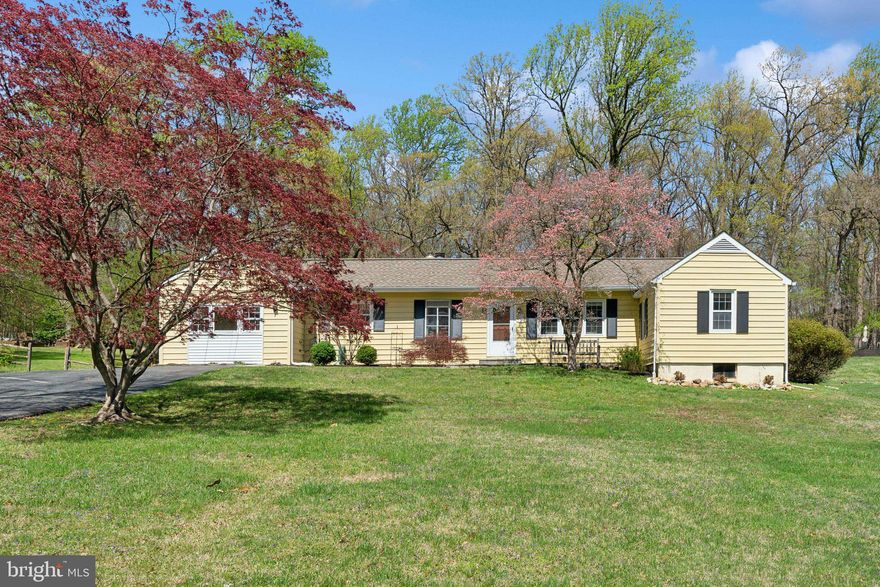 SPRAWLING RAMBLER ON LARGE LOT!! Tucked away yet conveniently located, this well kept home offers comfortable one level living with space and privacy in a charming setting.. The home welcomes you with recently finished hardwood floors.. The main living space flows seamlessly to both the kitchen and adjoining family room, offering ample space and options on use, recently remodeled bathroom... Dining room leads to breezeway which is a great seasonal space, perfect for summer gatherings or relaxing evenings.. The primary suite is tucked away on the far corner of the home, with vaulted ceilings, recently updated en suite, and large walk in closet, this is a restorative space for the owners to enjoy complete with access to a trex deck and rear yard.. Two additional bedrooms with new carpet..  Large two car garage has been refreshed with new floor coating, plenty of space for parking and storage with attic above.. Bonus room off the kitchen is the perfect flex space complete with half bath and closet space which could be used as guest suite, great room, or area for home business.. Partially fenced rear yard with mature landscaping.. This home offers so much and is just a short drive to the beltway, it should appeal to many, don't miss your opportunity, schedule your showing today!!