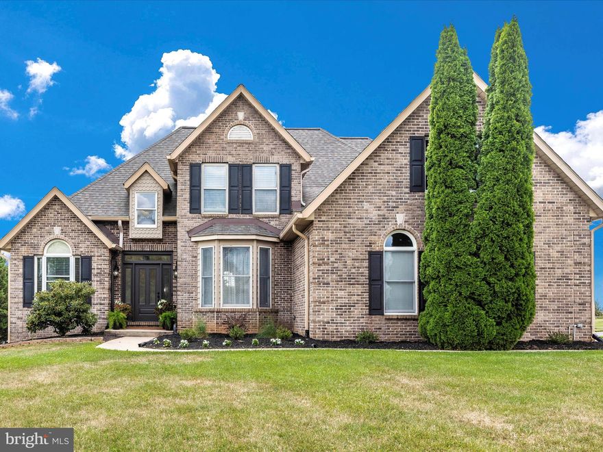 Gorgeous Home Situated on 2.01 Acres with Beautiful Views.  Home Offers 2 Car Side Load Garage,  5 Bedrooms, 3.5 Baths with Main Level Primary Suite,  Large Foyer,  Formal Dining Area,  Living/Sitting Area, Large Family Room with Wood Burning Fireplace and Open Modern Kitchen with Laundry on Main Level.   Upper Level Offers 4 Large Bedrooms and a Remodeled Full Bath w/ Quartz Countertops, New Sinks, Lighting, Mirrors, Faucets and Tile Surround in Shower.  Lower Level is Finished with a Bonus Room, Full Bath , Wet Bar, Pellet Stove, Storage and Walk Out To Huge Yard.  The Yard Offers 2 Out Buildings with Electric and Water,  Paver Patio and Deck for Entertaining.   Landscaping , Retaining Wall & Automated Lighting,  Updates Include Composite Roof was Replaced in 2017  w/ New Gutters,  Heat Pumps replaced 2015 & 2023 , Fireplace Insert 2020, Hot Water Heater 2015,  Double Oven 2015,  Granite Countertops in Kitchen Replaced in 2018,  Master Bath Redone in 2019.    Conveniently Located 5 Minutes From Route 70, Shopping, Restaurants.   Don't Wait or It May Be Too Late!!!