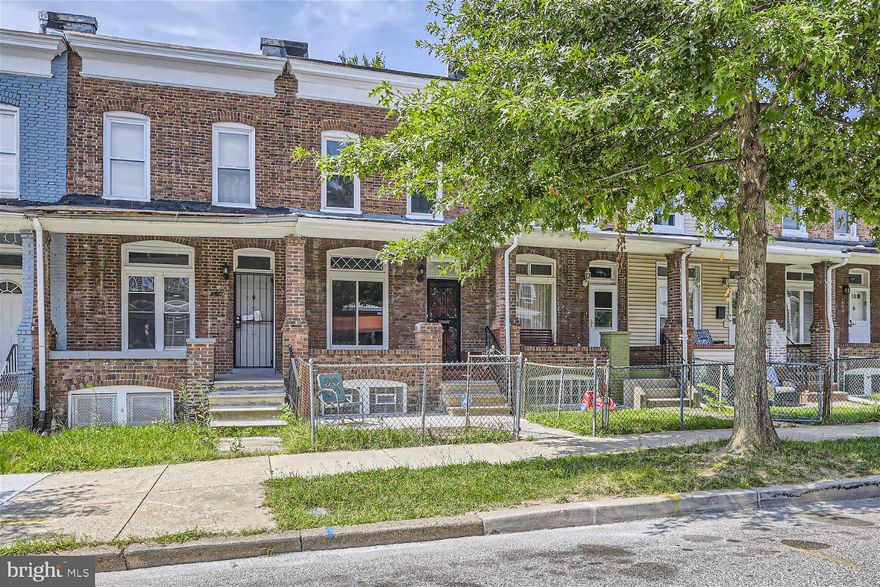 Newly renovated 3BR/1.5BA townhome located on a tree-lined street of the Montebello Historic District!  Step through the gated front yard to the covered front porch and open the door into your forever home.  The interior beams with natural light, a soft color palette and easy care flooring.  The open concept main floor offers a large living room/dining room, an amazing kitchen and half bath.  The kitchen boasts quartz countertops with a complementing backsplash, stainless steel appliances, and a large island with seating and cabinets below.  Onto the second floor with a large primary bedroom, a sizable secondary, a third bedroom with a skylight, and a beautifully tiled full bath with a walk-in shower. The lower level offers additional living space with above grade windows, a large family room, an ideal room for an office or gym, laundry, storage, and a walk-out to Bilco doors. From the main floor step out to a fenced yard and tons of possibilities.  This home is move-in ready with plenty to offer new homeowners including new flooring throughout, recessed lighting and so much more.  Imagine all this and in close proximity to shopping, restaurants, and commuter routes.
