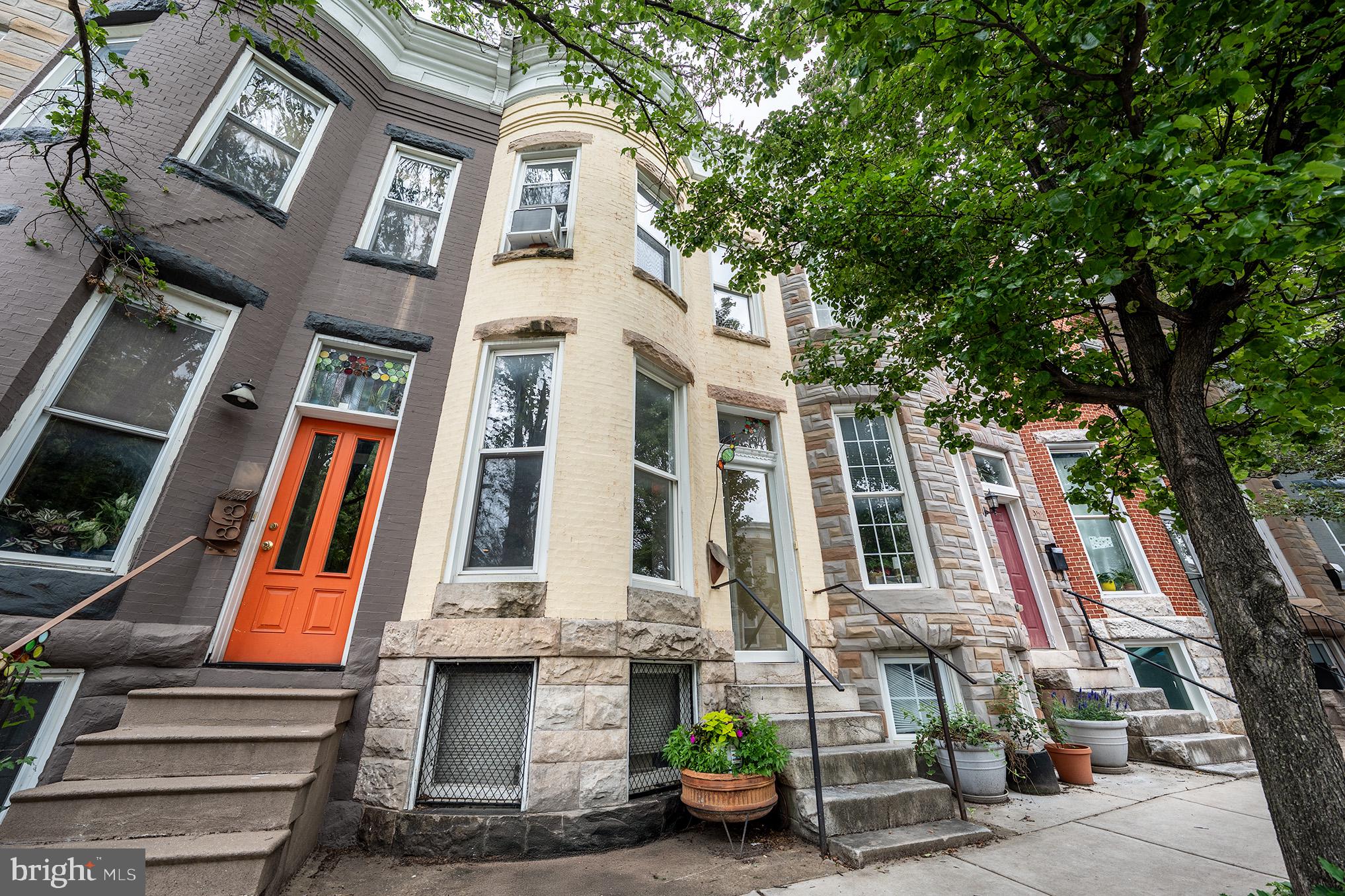 WELCOME HOME TO YOUR MOVE-IN READY HAMPDEN HOME!! Come be a part of the city vibe that only Hampden can offer. Cool shops, authentic dining, a brewery, and all just one block from the famed Hampden Christmas light extravaganza on 34th St! Just by entering the foyer you will know this home is special. The mailbox and front door transom stained glass are done by local artist, Wholly Terra. Inside this freshly painted home you will find original hardwood flooring that was refurbished in 2018, tall ceilings, a brick accent wall, and extra tall windows...all hallmarks of yesteryear! Head into the kitchen to find granite counters, beautiful cabinetry, stainless steel appliances (stove 2019), LVP planking for the floor (2021), and another brick accent wall! The kitchen opens into the dining area that is big enough for any table, or could be used as a second living space! Head upstairs to find 3 bedrooms and a full bath. The tall ceilings and large windows make this space feel extra large! The backyard is fenced in for your pet, and there is even a fruiting blueberry bush! The unfinished basement is perfect for all your storage needs! Check out the list of other updates: Roof and gutters (2021), water heater (2020), clothes dryer (2024). This home shows pride of ownership! No stone has been left unturned. Park your car and walk everywhere! Come enjoy all Hampden has to offer!