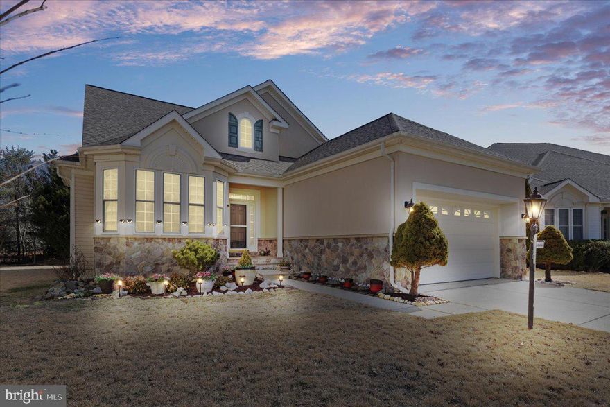 Pristine condition! You will love this spacious and beautiful Colonial with rare floor plan of over 3400 square ft of living space including a finished basement! Located in the sought after Heritage at St Charles, an active adult community (over 55) in White Plains MD, situated directly across from White Plains golf course! The entrance of the home has a large, covered porch that guides you to the 2 story foyer with hardwood floors. The main level is open concept with loads of natural light. The kitchen is a chef’s dream with plenty of cabinet space, prep island, and eat-in table space with tons of windows. Then to the formal dining room and living room with gas fireplace and granite mantle, that leads to the Trex rear deck for enjoying the outdoors. The primary bedroom boasts vaulted ceilings, floor to ceiling windows, 2 walk in closets, and third bonus closet. The primary bath suite has dual vanities, spa soaking tub, and tiled walk in shower perfect for relaxation. Main level laundry for your convenience. Two additional spacious bedrooms and a hall full bathroom complete this level. Upstairs you will find an additional bedroom and full bathroom. Now to the massive finished lower level! There are 3 areas for recreation, hobbies, office space, guest space, you name it! Complete with fitness room with a rough in for a bathroom. If you have guests visit from out of town this is the perfect house for you! Community Features: Heritage at St. Charles creates a fabulous lifestyle for its residents with a spectacular Community Clubhouse that includes: Indoor swimming pool and spa, state-of-the-art fitness center, Billiards room, Dining hall with a full kitchen, Book nook seating areas, Craft room, and Computer library room. Convenient to medical centers, hospitals, shopping, and restaurants. Don’t miss this opportunity—schedule your showing today and experience the resort-like community of Heritage at St. Charles!