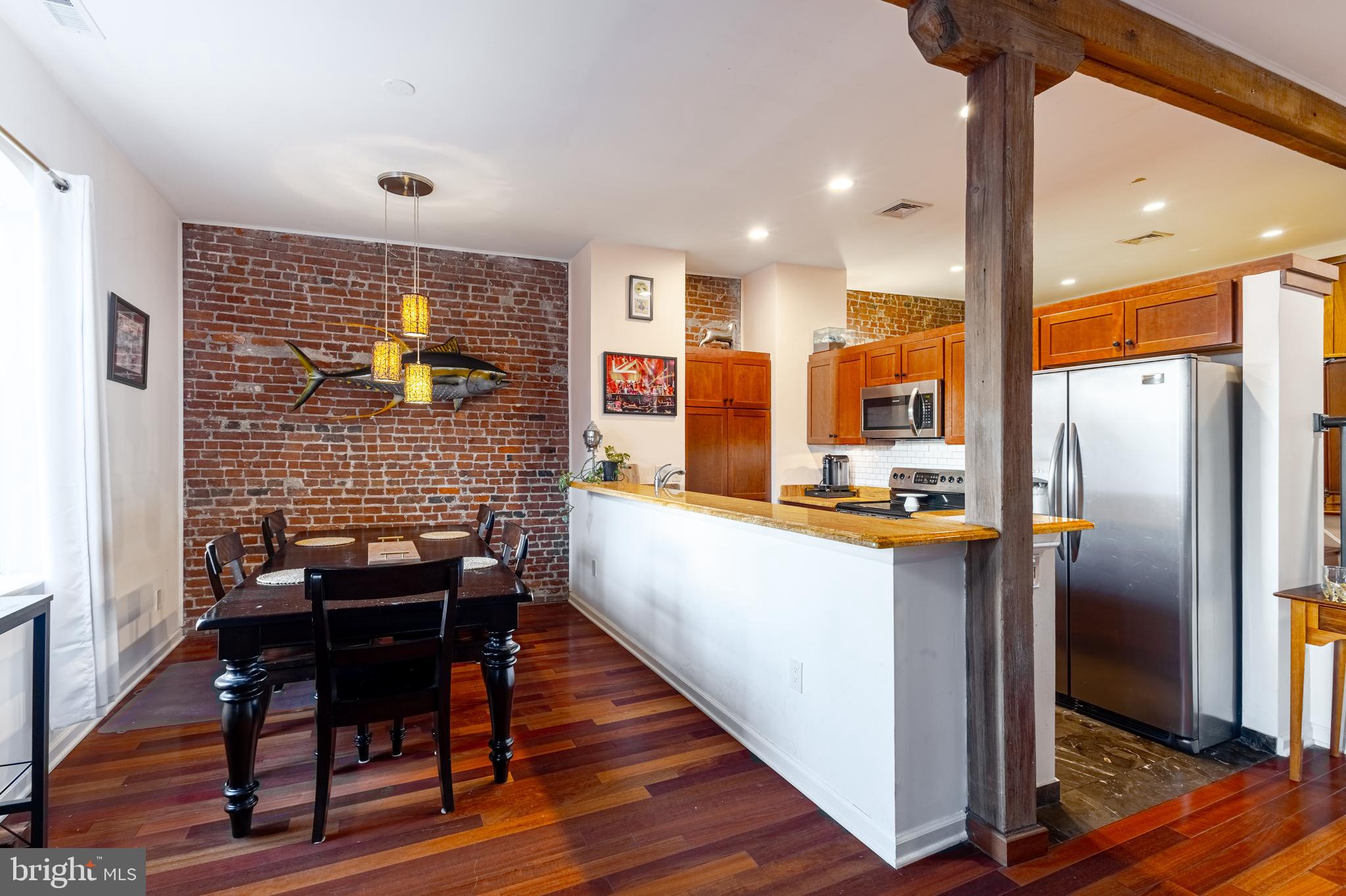 Welcome to 12-16 S Letitia Street! Located in the heart of Philadelphia's Old City, unit 501 is the perfect blend of city living and historic charm. This penthouse unit is a true showstopper, with oversized windows showcasing Philadelphia's skyline and timeless architecture, exposed brick, original beams that bring a rustic warmth, and hardwood flooring throughout. The completely updated kitchen and full pantry provide the perfect space for preparing meals and hosting gatherings that can comfortably spread out into your large dining/living room area. Completing the loft up the stairs is a full bathroom with in-unit washer and dryer, a large bedroom with exposed brick accents, and double closets. Additional building amenities include a shared rooftop deck on the 6th floor where you can enjoy 360-degree city views- The PERFECT spot to watch summer sunsets. The building also provides a private storage space in the basement for each unit. There is little left to be desired with this Old City gem and its proximity to some of Philadelphia's finest shops and restaurants- Soon to also be steps away from the Penn's Landing Park, a roughly $2 billion project which is currently underway. You do not want to miss the opportunity to own this amazing unit in the heart of Old City!