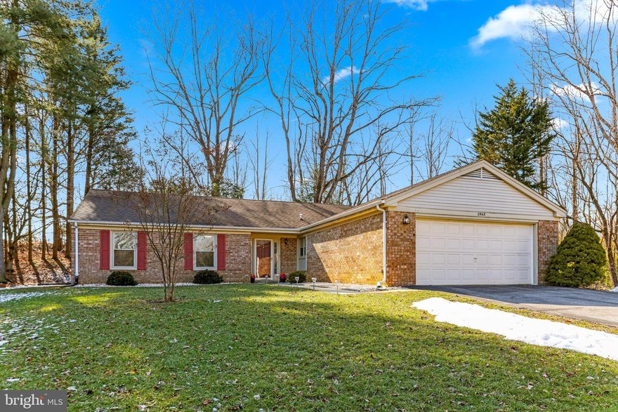 ONE LEVEL LIVING IN A HIGHLY DESIRABLE LOCATION W/IN THE 55+ COMMUNITY OF HERITAGE HARBOUR * COME SEE ALL THIS AMENITY RICH NEIGHBORHOOD HAS TO OFFER; WATER ACCESS, CANOEING/KAYAKING, POOLS - INSIDE AND OUT, FITNESS CENTER, GOLF, TENNIS, PICKLEBALL, LIBRARY, CLASSES, CLUBS .  .  .  . IT'S TIME TO START ENJOYING YOUR LIFE! 
YOU WILL NOT FIND A MORE COVETED LOCATION IN HERITAGE HARBOUR. THIS HOME IS SET BACK AT THE VERY END OF A QUIET CUL-DE-SAC WITH AN INCREDIBLY PRIVATE REAR YARD SURROUNDED BY PICTURESQUE LANDSCAPING. SHINING BRIGHTLY ON APPROACH THE SIDING AND STONE WORK HAS JUST BEEN POWER-WASHED, GUTTERS CLEANED & LANDSCAPING TRIMMED. IN ADDITION TO A 2 CAR GARAGE THERE IS PLENTY OF OFF STREET PARKING. INSIDE YOU WILL FIND AN OPEN FLOOR PLAN WITH EASY TO CARE FOR FLOORING; BOTH HARDWOODS AND CERAMIC TILE. THE INTERIOR HAS BEEN FRESHLY PAINTED AND ALL ELECTRICAL OUTLETS, SWITCHES AND COVER PLATES REPLACED. THIS POPULAR FLOOR PLAN OFFERS 3 BEDROOMS, 2 FULL BATHS, A HUGE LIVING & DINING ROOM W/ A FIREPLACE, PLUS A BONUS ROOM TO BE USED ACCORDING TO YOUR LIFESTYLE. YOU WILL LOVE SPENDING TIME IN THE BRIGHT, EXPANSIVE KITCHEN WITH CHEERY, WHITE CABINETRY & GRANITE COUNTERTOPS AS WELL AS A BUILT IN ISLAND COMFORTABLE FOR SEATING 4 PEOPLE. THERE IS CONVENIENT ACCESS TO THE KITCHEN FROM THE GARAGE FOR UNLOADING GROCERIES AND TO THE LAUNDRY AREA WHICH SEEMS TO BE A DAILY TASK! PERHAPS THE MOST UNIQUE ASPECT OF THIS HOME IS IT'S PRIVATE REAR YARD. YOU WILL FIND A BEAUTIFUL, ARCHED, STONE PATIO AND RETAINING WALL OFFERING AN OASIS OF PEACE SURROUNDED BY MATURE LANDSCAPING WHICH WILL BE BURSTING WITH GROWTH & COLOR IN 6 - 8 WEEKS. YOU'LL HAVE EASY ACCESS  TO DC, BALTIMORE, HISTORIC ANNAPOLIS, THE CHESAPEAKE BAY, ANNE ARUNDEL MEDICAL CENTER, SHOPPING & RESTAURANTS. 
YOU REALLY CAN HAVE IT ALL & YOU DESERVE IT!