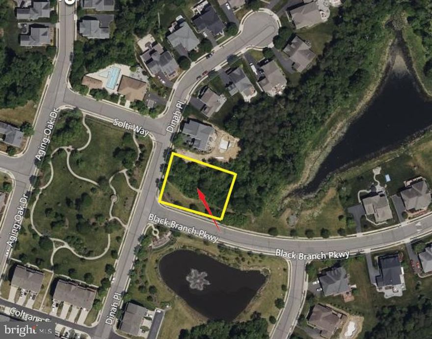 A rare opportunity to own a commercial/industrial .51 ac corner parcel in the Greene Mill Preserve; a unique, Rural Village community of 224 homes nestled among nature’s finest amenities in picturesque Loudoun County.
This unimproved corner lot has convenient access to public utilities, and current zoning permits a wide variety of uses as well as the inclusion of an Accessory Dwelling Unit (ADU) up to 1200 sf above the first floor, which could be a great option for a variety of needs including as a business owner residence. Current zoning also permits a structure up to 3 level or 40' max height, and up to 5,000 sf of retail space, up to 10,000 sf of office space. Information on a site plan for a 2-story adult daycare facility as permitted (1,500 sf per level) with 31 parking spaces approved by Loudoun County in 2007 "is still valid until July 1, 2025" per Loudoun County Department of Planning and Zoning.  The documents can be made available for convenient reference. Note that Convenience Food Stores, Service Stations, and fast-food Restaurants are currently prohibited by proffer. Purchasers are encouraged to review current zoning allowable uses in table Table 3.02.04-1 PD-RV Work UseTable 
 and the related community proffers.  
The parcel is located in the heart of the community on a street corner across from their beautiful common area with walking paths, as well as the clubhouse with the community pool. On one of only two roads into and out of the community, located in the highly sought-after Greene Mill Preserve – close to the necessary everyday conveniences and commuting routes, IAD airport, and the Loudoun County Info Technology center, yet not too close to the city center. It is an ideal location for building a strong business-community relationship with great visibility and easy access.