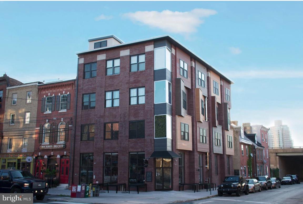 Beautiful 3 bedroom, 2 bath located in Philadelphia's up-and-coming northern liberties area. Hardwood flooring throughout the open living and dining room space showcases the modern kitchen, which features stainless steel appliances, quartz countertops, and pendant lighting. The Master Bedroom is filled with natural light with floor-to-ceiling windows, plush carpet, and a ceiling fan. The spacious second bedroom is also as luxurious with its carpeting, large windows, ceiling fan, and ample closet space. Discover the full bathroom with its designer tile flooring, modern vanity, and large frameless glass-enclosed shower. Washer and dryer included in the unit. Shared rooftop to enjoy the city views. This hot spot is just mere steps away from various great restaurants, cafes, and shopping. Photos of similar units.
