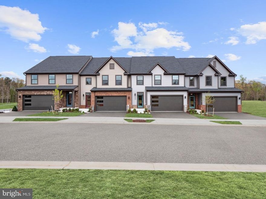 To be built Griffin Hall Villa at Tanyard Shores . The moment you step into the Griffin Hall you will recognize its elegance and functional style, with every amenity located on the first floor for the ultimate in convenience. The expansive Foyer frames the view into the formal Dining Room and Great Room. The gourmet kitchen is a cook's delight breakfast bar that gives plenty of access to the dining area. The light and airy Great Room is perfect for entertaining. Don't forget to select the sunroom for even more light, and the optional fireplace to make things cozy. The primary Suite features a gigantic walk-in closet and bath with dual vanity and shower, the primary Suite is sure to become a private retreat. Personalize your bathroom space with the oversized shower with seat. Upstairs, there are two additional bedrooms -- each with walk-in closets -- a Loft, full bath, and plenty of storage space. Many areas offer an optional finished lower level with space for a Recreation Room, bath and Study. The Griffin Hall comes in a variety of brick and siding traditional facades and features a two-car garage.).    Welcome to Tanyard Shores' exclusive 55+ active adult neighborhood! Enjoy the lifestyle of a waterfront community with resort-style amenities.      Tanyard Shores' resort style amenities include: An exclusive 55+ active adult clubhouse along with all the other community amenities to enjoy.  Outdoor pool, fitness center, yoga studio, coffee bar, indoor and outdoor dining areas, and firepit. You'll love having water access, dock & boat slips, beach area with kayak storage, hiking trails, dog park, and more!  Our villas will provide you with the space and layout you need with a 2-car garage and main level living with a 1st Floor Owner's Suite. Other floor plans and homesites are available.  Photos are representative.  Ryan Homes is taking precautionary measures to protect our valued customers and employees.  Our models are open by appointment.