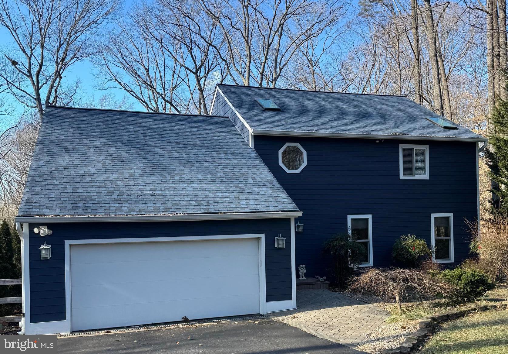 Welcome home to this gorgeous 4-bedroom, 3-bath home in the sought-after North River Forest neighborhood. Situated on over an acre, this property features a bright, open floor plan with two first-floor bedrooms and a full bath, plus a spacious family room with soaring ceilings, skylights, and beautiful hardwood floors.
The eat-in chef’s kitchen is a dream—complete with a gas cooktop, double ovens, island, quartz countertops, and a huge pantry that’s practically its own room. Perfect for hosting and everyday living!
Upstairs, the expansive primary suite includes room for a sitting area and a luxurious private bath with a soaking tub and walk-in shower. A charming loft area overlooks the family room below, adding even more versatility to the layout.
The lower level features a fourth bedroom, a full bath, a laundry room, and a flexible rec room or bonus space to use however you need.
The exterior is clad in high-end Hardie Plank fiber cement siding—a hallmark of quality construction. Outdoor living is just as impressive with a large Trex deck, partially covered and partially open. In the summer, you can cool off or get in a workout in the 15-foot swim spa, and in winter, enjoy the peaceful views of the South River. Backing to community open space, the property offers a rare sense of privacy and tranquility.
All this, just minutes from shopping, restaurants, and commuter routes. This is a truly special opportunity you won’t want to miss.