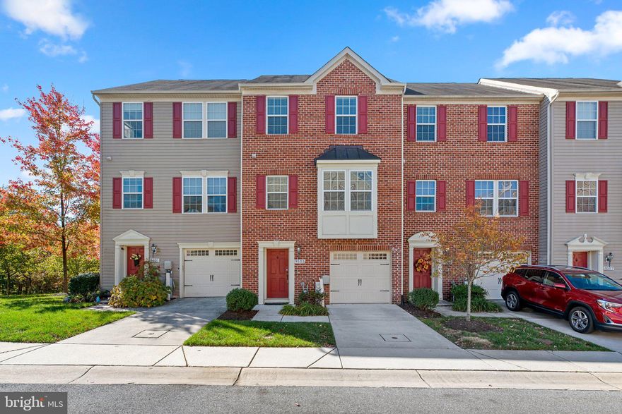 Welcome to this charming 3-bedroom townhome nestled in the sought-after Dorsey Crossing Neighborhood. With warm wood-look flooring on the main level and neutral paint throughout, this home offers a cozy and inviting atmosphere, ready to welcome you.

The main level features a convenient half bath for your guests' comfort and a spacious eat-in kitchen that's an absolute dream. The kitchen boasts stainless steel appliances, beautiful countertops, and a center island for extra food prep space. You'll love the drop-in sink with a high-end faucet and the detailed tile backsplash that adds a touch of elegance to your cooking space. The dining area offers sliders that lead to a large deck, perfect for outdoor dining and entertaining.

Upstairs, the primary bedroom welcomes you with an ensuite bathroom and a spacious closet, providing a private retreat to unwind and refresh. The well-designed layout ensures comfort and convenience for daily living.

The lower level features a family room with a sliding door that grants access to the back yard, offering additional space to relax and enjoy. The one-car garage adds convenience and functionality to your daily routine.

This home is perfectly located just minutes away from Centennial Park and Fairway Hills Golf Club, offering a wealth of recreational and leisure opportunities. The meticulous care and pride of ownership shine through, making this townhome truly special.

Don't miss the chance to make this house your new home. Schedule a showing today!