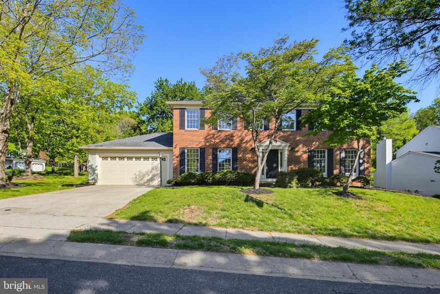 Welcome to this stunning 5-bedroom, 3.5-bath colonial in the highly coveted Dorsey Hall community of Ellicott City. Offering over 3,600 total square feet of finished living space, this home perfectly balances traditional charm with modern versatility.

The main level greets you with luxury vinyl plank flooring, elegant crown moldings, and chair rail detailing. The light-filled layout features an expansive living room accessed via French doors, a formal dining room with a designer chandelier, and a cozy family room centered around a wood stove with a blower. The heart of the home is the eat-in kitchen, boasting sparkling countertops, stainless steel appliances, a breakfast bar, and a sun-drenched breakfast nook framed by beautiful bay windows.

Retire to the upper level featuring five spacious bedrooms. The primary suite offers a private en suite bath with dual vanities, while the fifth bedroom features dual access—perfect for a nursery, home office, or library.

The fully finished lower level is a true standout, designed for multi-generational living or the ultimate entertainment hub. It features a high-end kitchenette with maple cabinetry, granite counters, a Vissani® beverage fridge, and a clever all-in-one European washer/dryer. This level also includes two versatile bonus rooms and a third full updated bathroom.

Outdoor living is a dream on this private corner lot. Backing to mature trees, the rear yard features a large wood deck, and professional landscaping. Enjoy the best of Ellicott City with nearby walking trails, playgrounds, and easy access to major commuter routes. Welcome Home!