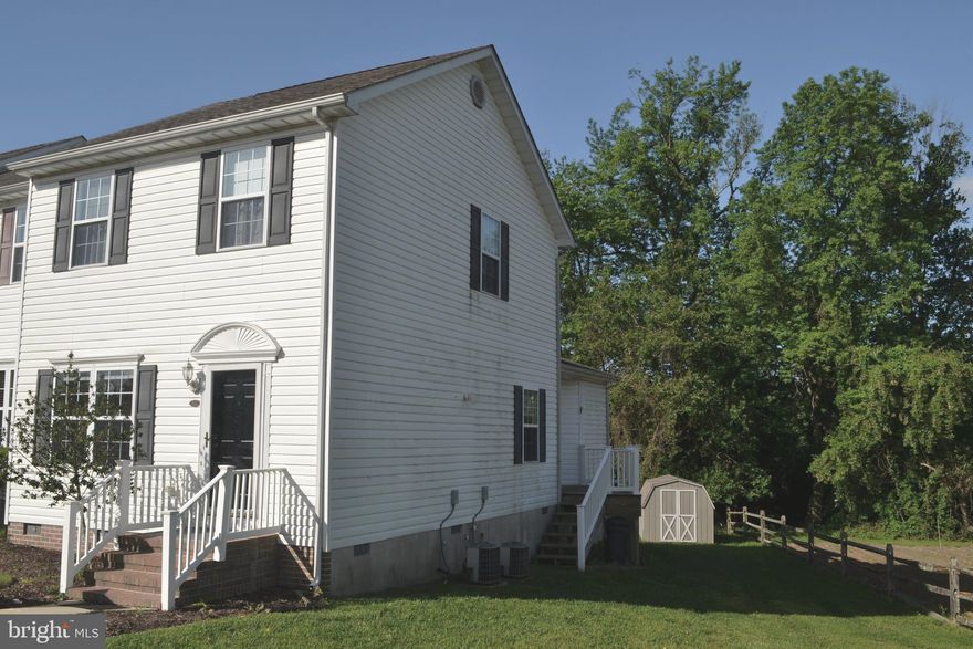 Welcome to 8186 June Way, #307 in Easton—a move-in ready, spacious and bright three-bedroom end townhome located just one mile from downtown Easton. This beautifully situated unit offers the best location in the townhome section of Waylands, featuring a large backyard bordered by trees and a private side deck off the kitchen/dining area overlooking peaceful greenspace. Inside, you’ll find a well-designed floor plan with a first-floor primary suite, open kitchen with breakfast bar flowing into the dining area, a large living room, and convenient laundry on the main level. Upstairs includes two generously sized bedrooms with plenty of closet space and a full hall bath. Additional highlights include ample storage in the attic, a large detached backyard shed, and crawl space access at the rear of the home. Conveniently located near shopping (Giant, Walmart, and more) and with quick access to Route 50 for commuters.