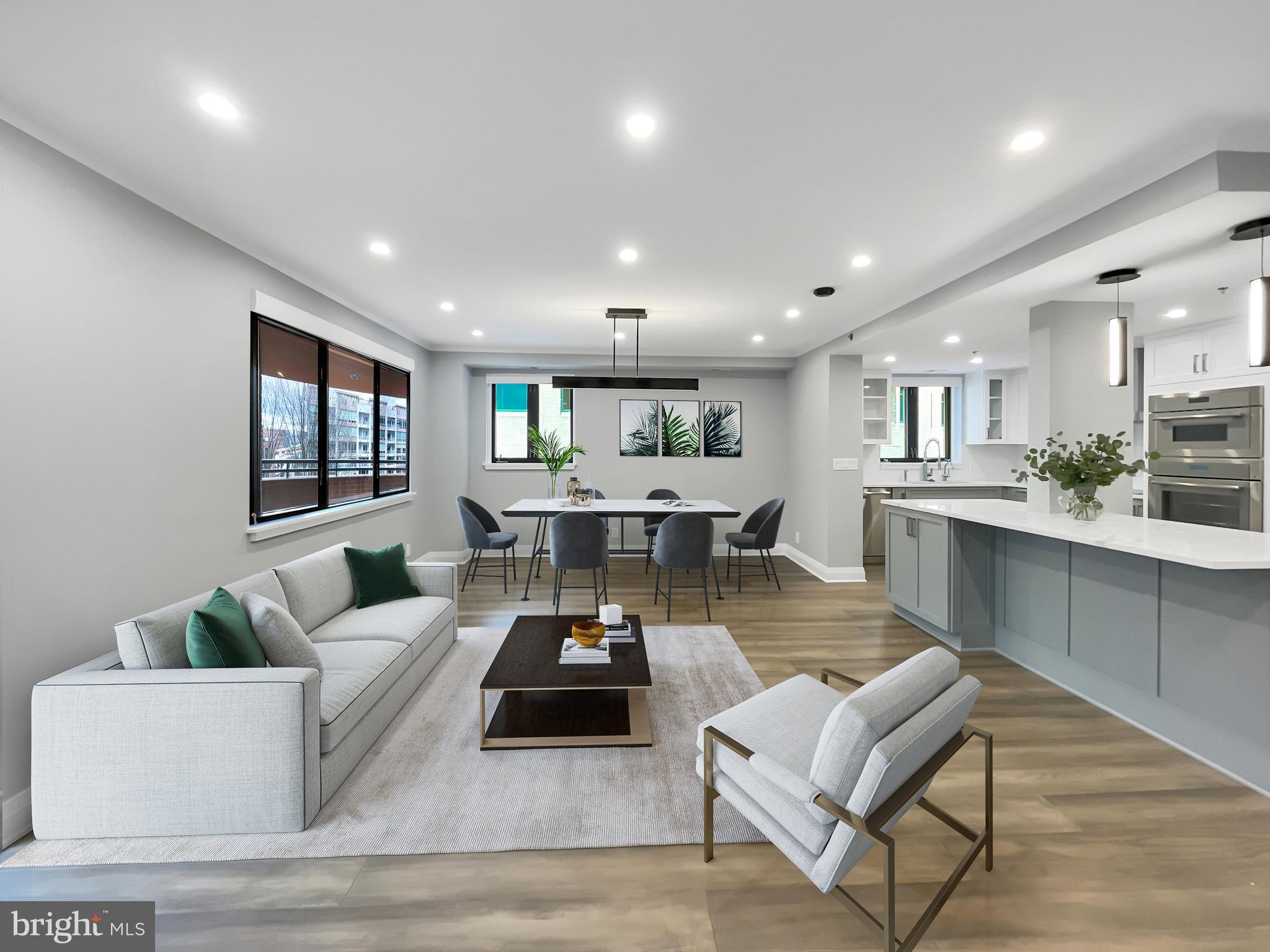 Live in this spectacularly renovated condo in the heart of vibrant Bethesda! Welcome to 4801 Hampden Lane unit #402, with almost 1,600 square feet of luxurious living in a boutique building. An open floor plan, a new high-end chef’s kitchen, two full designer baths, a rare three bedrooms, and outdoor space awaits you. No expense was spared in the kitchen, which includes a Thermador appliance suite of a freedom induction cooktop, two wall ovens (a speed oven/microwave combo and a traditional oven), built-in fridge and dishwasher, two-toned white and gray shaker cabinets, and quartz countertops. The renovation also brings you new luxury plank flooring, bright lighting, automated mechanical shades and an entertainment/sound center (with speakers in all rooms and smartphone control), in addition to full-sized in-unit laundry and fully-upgraded high-efficiency systems, including a brand new heat-pump water heater and HVAC. Don’t miss the innovative Murphy bunk beds in the second bedroom which convert into desks when not used to make for a flexible sleep or work space. The third bedroom, adjacent to the primary, is complete with gorgeous built-ins and also can function as a den, office, or nursery. With only four units on each floor, this building is uniquely quiet and private. It also boasts amenities such as a fitness center, party room, one garage reserved parking space, extra storage (within steps of the reserved parking space), and additional visitor parking. Pets are welcome! Just steps to downtown Bethesda and a 2-minute walk to the Metro on the Red Line, the location offers a plethora of shopping, dining, entertainment and commuting options, from juice and coffee houses to start your day to elegant restaurants to end your evening.