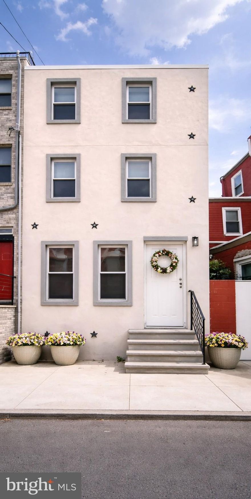 10-YEAR TAX ABATEMENT! Thousands in annual savings — invest in your lifestyle, not your tax bill. Take advantage of the financial savings from a 10-year tax abatement while enjoying the feel of basically brand-new construction, complete with a home warranty included in the sale. This property was fully gutted down to the studs and completely rebuilt, giving it a fresh, modern look throughout.

Brand-new construction feel. Proven neighborhood appreciation. And a 10-year tax abatement that puts real money back in your pocket every single year. Welcome to 1307 N. Randolph Street — a fully gut-renovated, three-story rowhome that delivers the best of Philadelphia living without compromise. Stripped to the studs and completely rebuilt from the ground up, this home pairs the durability and character of Philadelphia’s iconic rowhouse architecture with the clean lines, open feel, and modern finishes today’s buyers demand. A 13-month HWA home warranty is included, giving you total peace of mind from day one.

This stunning three-story home is located adjacent to the highly desirable Olde Kensington neighborhood of Philadelphia, just minutes from Northern Liberties and Fishtown. Featuring 3 bedrooms and 3.5 bathrooms, the home has been thoughtfully upgraded and offers a perfect balance of modern elegance and city convenience. Each spacious bedroom includes its own private en suite bathroom, creating a comfortable and private retreat for every occupant.

Step through the front door and sunlight greets you immediately. As you enter, you’re welcomed by a bright living room with gleaming hardwood floors that flow seamlessly throughout the home. Across the stairwell is the dining area, offering a warm and inviting space for meals and gatherings. The galley-style kitchen is a standout feature, equipped with top-of-the-line stainless steel appliances, white shaker cabinetry, a sleek subway tile backsplash, and a built-in skylight that fills the space with natural light. A rear addition expands the home’s living space and enhances the kitchen area. A conveniently located half bath sits between the kitchen and dining area on the main level.

Just off the kitchen, the rear door leads to a large private backyard — perfect for entertaining, gardening, or relaxing outdoors. A genuine rarity in this part of the city. Grill under the open sky, plant a garden, set up a lounge area, or simply enjoy the quiet. In a neighborhood where outdoor space is at a premium, this yard is a game-changer.

On the second floor, you’ll find two generously sized bedrooms, while the third floor features the final bedroom, ideal for a guest suite or primary retreat. All three bedrooms are thoughtfully positioned and every single one includes its own private en suite bathroom — a layout that is exceptionally rare at this price point. All three full bathrooms are designed with floor-to-ceiling tile, glass shower doors, and modern vanities, showcasing a clean and contemporary style that delivers a spa-like experience in every suite.

The lower level includes laundry facilities, mechanical systems, and ample storage space — keeping the practical essentials organized and out of the way so every finished floor above stays clean, open, and livable.

Situated adjacent to the highly coveted Olde Kensington neighborhood and just minutes from the restaurants, bars, and boutiques of Northern Liberties and Fishtown, this address puts you at the center of Philadelphia’s most exciting corridor. The location provides convenient access to Center City, Northern Liberties, universities, hospitals, public transportation, local restaurants, cafés, and the Cruz Recreation Center. With a Walk Score of 89, nearly everything you need is within a short stroll.

New construction quality. Tax abatement savings. Suite-style bedrooms with private en suite bathrooms. Private backyard. Home warranty included. Homes like this don’t stay on the market — they create bidding wars.