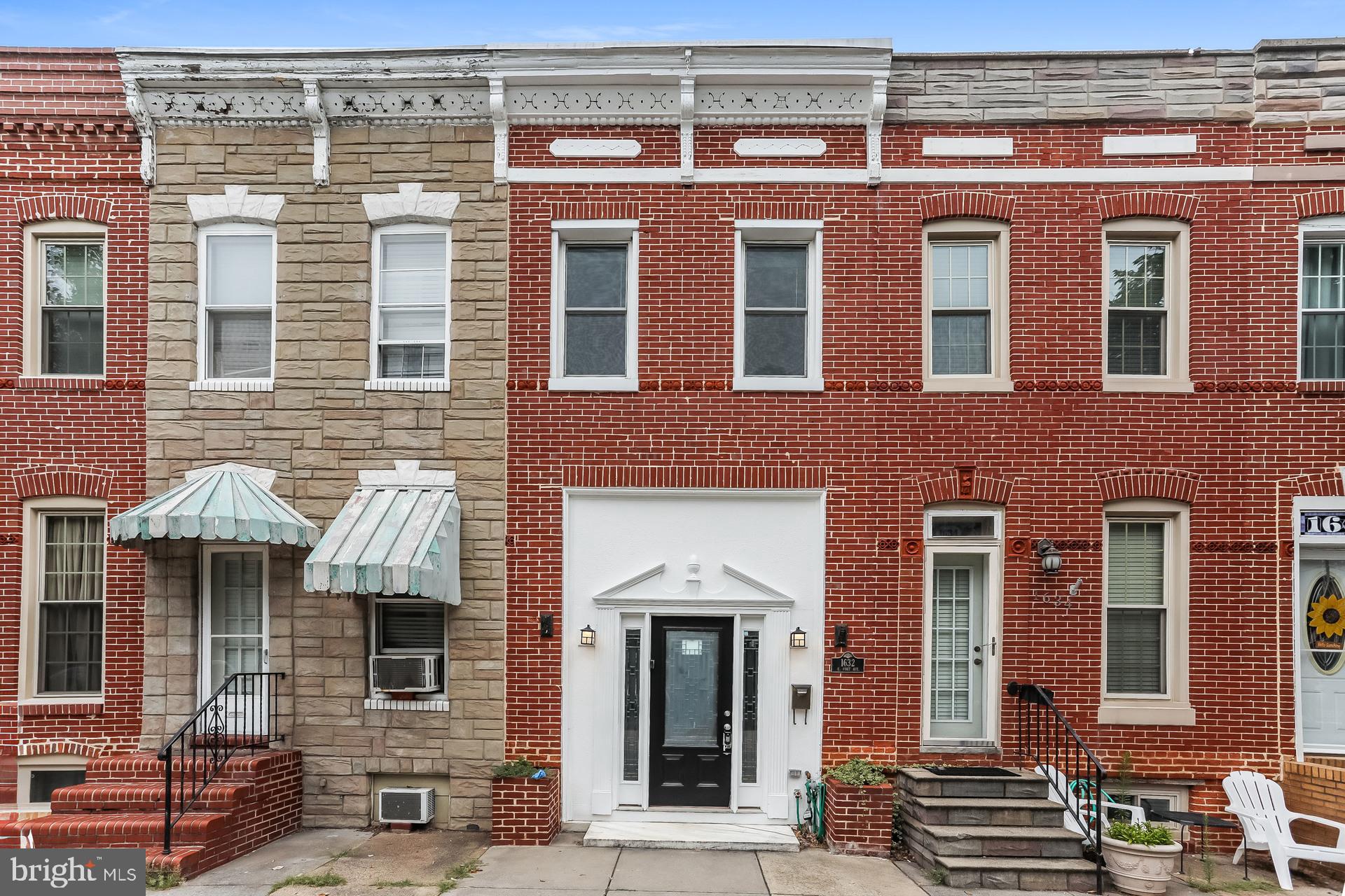 Welcome to 1632 E Fort Ave in desirable Locust Point — a stunning Baltimore City rowhome designed for home buyers who value a walkable lifestyle and urban amenities. This beautifully updated 2 bed, 2 bath home features 1,590 sq ft of living space with exposed brick accents, hardwood floors, and an updated kitchen with stainless steel appliances. Spacious bedrooms, a finished basement, and a fenced backyard offer plenty of room to relax and entertain. Located directly across from Latrobe Park, blocks from the marina, a short walk to the Patapsco Riverside, local restaurants, shops, Harris Teeter at McHenry Row, and fitness centers. Embrace Baltimore City living at it's best! Schedule a tour today.