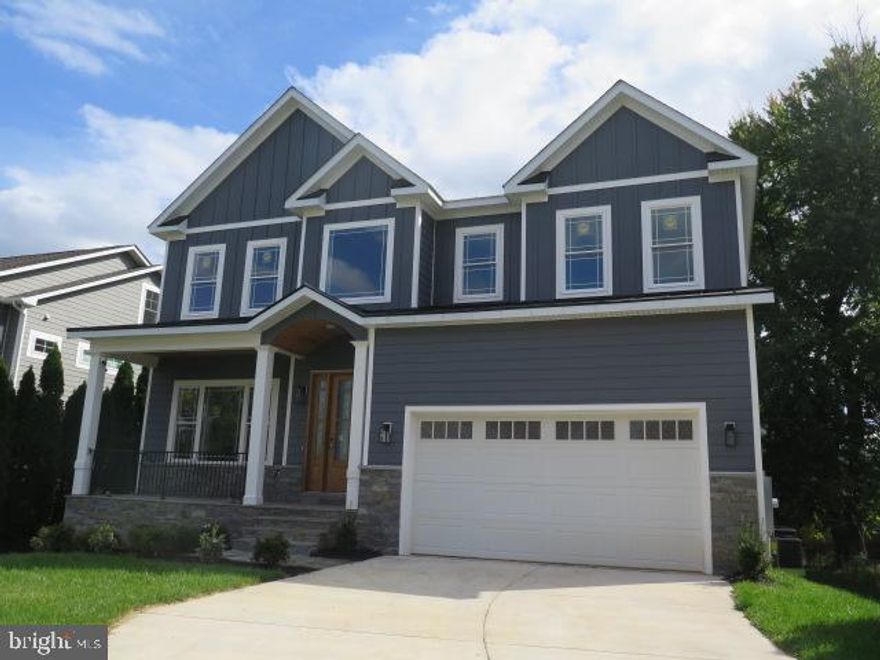 NEW CONSTRUCTION for late December delivery!  Just one mile to McLean Silver Line Metro station and extensive shopping + commute options of Tysons Corner area.  South facing Kitchen and Breakfast areas overlook flat yard.  Gorgeous Hardie Plank and Stone home with covered front porch. 7400+ sq ft of living space on three levels including walk out basement. Kitchen and all bathrooms individualized by custom tile work. Impressive entry foyer / high, tray, and coffered ceilings / custom trim work / light color flooring on all levels / contemporary horizontal railing on staircases / contemporary light fixtures / ceiling fans. Great flow of open space through main level with gourmet island kitchen, family room warmed by gas fireplace, living and dining areas, main level office/playroom/bedroom with full bath, drop zone plus powder room next to garage entry. Kitchen includes deep ceramic farm sink, butlers pantry, oversized island with room for seating, and Stainless appliances featuring gas cooking with pot filler above, range hood, double oven with microwave, 48" refrigerator, custom cabinetry to ceiling highlighted by accent lighting in cabinets, under cabinet, and toe kick.  Owner's suite Bath with heated floors!,  soaker tub plus oversized shower and three walk in closets. Four total Bedrooms on upper level all with en-suite Baths. Walk out Lower Level hosts full size windows, Media Center, Recreation Room with Wet Bar, two Bedrooms with full Bathrooms. Upper level and Lower level Laundry Rooms. Attention to details and quality include Pella windows, dual zone programmable HVAC, floor to ceiling tiles in all baths, dim lighting for media center, garage door keypad and opener, 220 outlet in garage for electric vehicle charging. Natural gas for furnace, water heater, cooking, fireplace. No HOA dues.  For visual of completed home by same builder please visit  3806 Hummer Road  VAFX2122934.