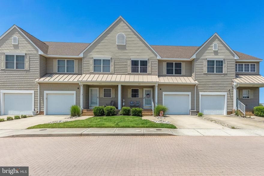 Sit back and relax and watch the beautiful sunsets in this well-maintained, freshly painted 4 bedroom 3 bathroom condo located in the golf-cart waterfront community of Crisfield, MD. If sitting indoors isn't for you, grab a beach towel and sit on your own sandy beach or enjoy the community pool. Relax in 1 of the 2 enclosed porches and watch the boats go by on the Little Annemessex River which flows into the Tangier Sound. Upgrades include a new HVAC in 2021, new appliances in 2023, LVP flooring in 2019, carpet in 2022, replaced all light fixtures, roof replaced in 2019, and more! Inside the garage, store the kayaks in the included kayak holders and enjoy the built in shelves. Included in the purchase of this condo is boat slip D8! Another great key factor about this home is that the current mortgage is VA assumable! Whether you are looking for a place to retire, a second home, or a permanent residence, this waterfront condo in this waterfront community is the perfect place to call Home.