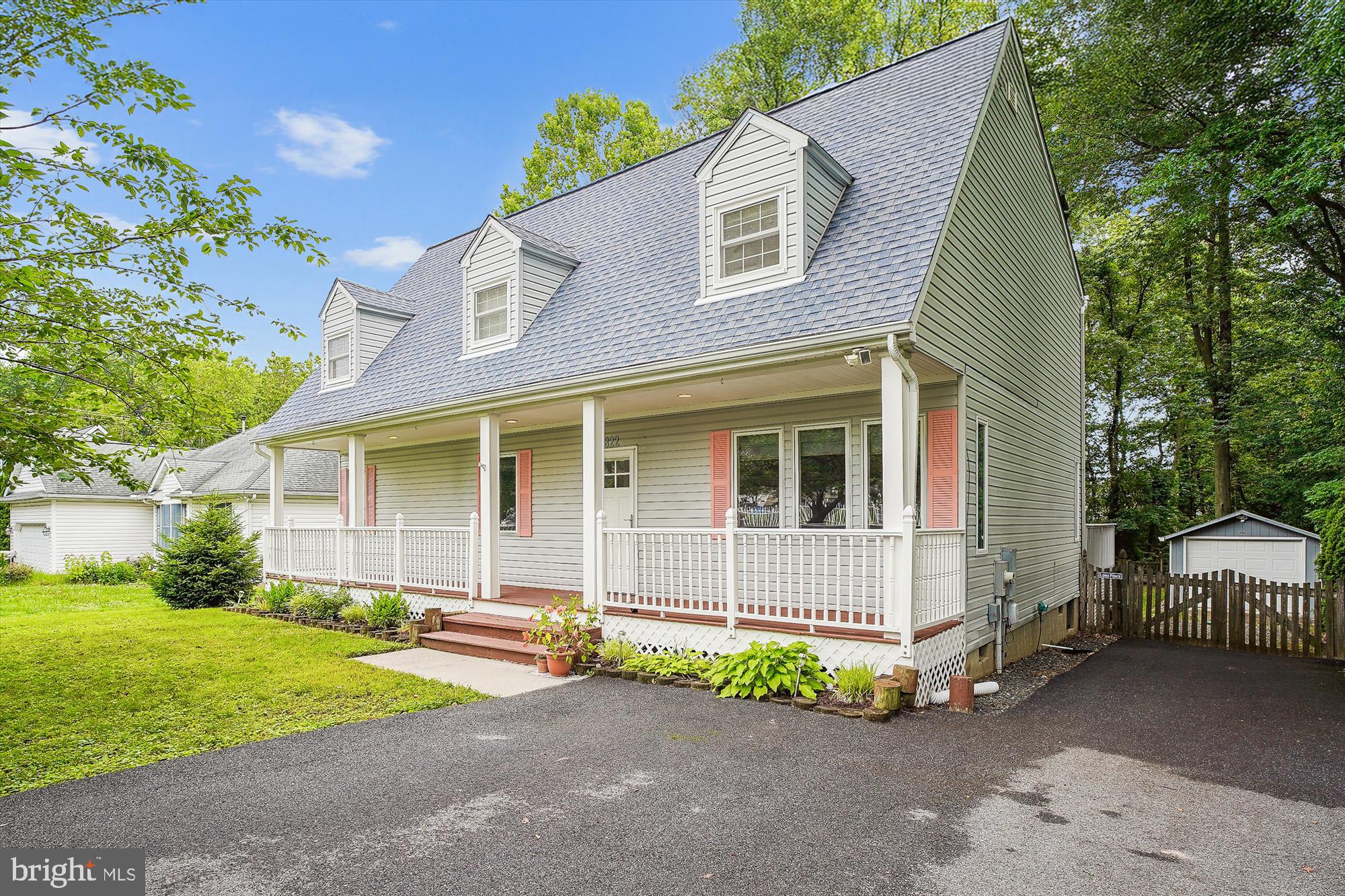 ***Price Improvement*** Create a life you won't want to escape from in this 4 BR, 2.5 bath water access home in highly sought after Cloverfields community! The unique floor plan is perfect for multi-generational living; you have two large primary suites to choose from, one on the main floor with an attached full bath to include a jetted tub, separate shower and huge walk-in closet. The bright open kitchen sports tons of storage, granite counters, and dual ovens in your gas range. Upstairs boasts spacious rooms complemented by a bonus space perfect for an office, library, or the gamers in your household. The upstairs laundry even gets a bright room of its own with raised front loads that make necessary chores a little less dreary. There are no worries on the mechanical front either - there's a brand new (2025) hybrid HVAC system with a 10-yr warranty that makes heating and cooling very energy efficient! From the new gutter guards (2025) to the insulated crawl space, your new home is highly efficient with a tankless water heater and a propane pre-buy program. Outside, the relaxation and no worry lifestyle continues! There's plenty of room for everyone on the large deck (complete with real wood furniture that conveys) overlooking your fenced backyard with native landscaping, mature shade trees, and a stone fire pit. The oversized garage/workshop includes a workbench with storage space while a separate shed gives you plenty of space to store lawn equipment or beach toys. That's right - you can walk to the beach, passing the large community pool on the way! This family friendly neighborhood has it all with HOA fees of less than $17/month. Spend your day at the beach, come home to a crab feast on the deck, and close the night out around the fire pit building lifelong memories! Located in Cloverfields water privileged community with water & community amenities along the Chester River. Enjoy the community boat launch ramp & slips for rent, community beach with netted swimming area, Community pool and more!