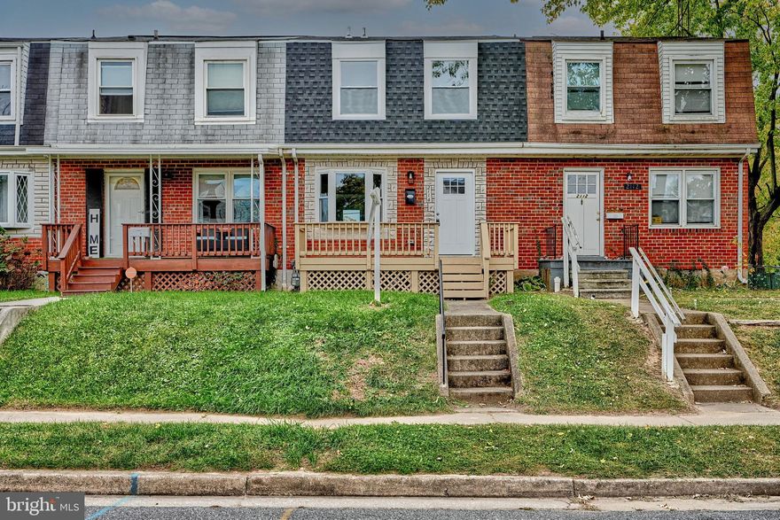 Newly renovated  4BR/2BA brick Townhome located on a quiet street in Hawthorne.  Walk up to the newly refreshed front deck and open the door into your new home.  Inside you will find an open concept main floor offering a soft color pallet, easy care flooring, recessed lighting, and tons of natural light. A large living room, ideal when hosting family and friends, a spacious dining room and a new kitchen compose the main floor.  The kitchen features new stainless steel appliances, plenty of cabinets to the ceiling, stunning granite countertops with a tiled backsplash, and a deep sink set into a large island with pendant lights and breakfast seating.  On the second floor is a spacious primary bedroom, two sizable secondary bedrooms, and a newly renovated full bath with a double sink vanity and a beautifully tiled tub surround.  The lower level offers a fourth bedroom, a new full bath, a large family room for everyone to enjoy, storage, laundry, and a walk-out to the yard.  From the main floor step outside to a spacious yard filled with possibilities, green space, and a parking pad for off street parking.  This home is move-in ready with so much to offer new homeowners and is located in close proximity to shopping, restaurants, and commuter routes.