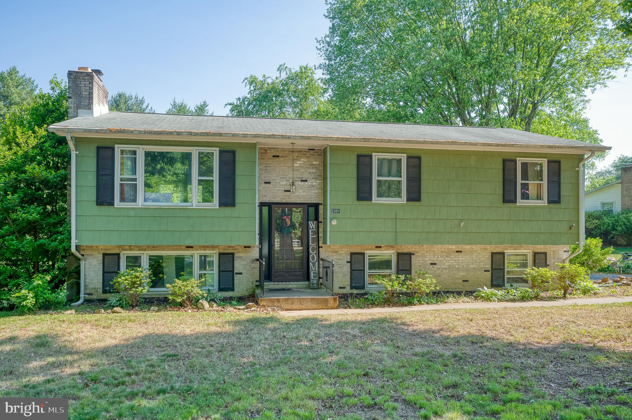 Welcome to 2301 Cheyenne Avenue, in the sought-after Fallston School District. This split foyer is situated on a private .57 acre corner lot with mature trees. The kitchen was opened to the dining room (ceiling repairs not complete) for an open concept with gorgeous counters, stainless steel appliances, recessed lighting and center island/breakfast bar (2021). There are sliders to a rear deck with stairs to the lower level patio and yard. There are refinished hardwood floors on throughout the main level (2021). The living room has plenty of natural light with a large window and neutral paint. The full bathroom was renovated and the primary bathroom is prepped for completion (materials to stay). The walkout lower level has a huge family room, updated powder room and storage area with laundry. This unique home has tons of potential and awaits your finishing touches. Other updates include septic (2022) and hot water heater (2016). No HOA. Property to be sold AS-IS. Any inspections are for informational purposes. OFFER DEADLINE Sunday, 6/4/23, 9 p.m.