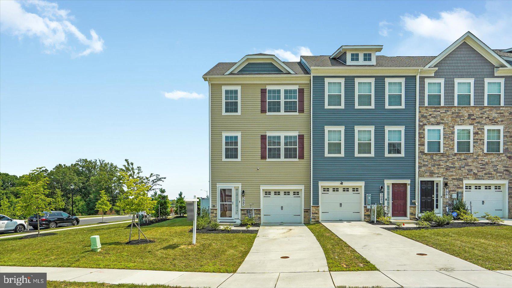 Beautifully maintained and move-in ready 4BR/3.5BA end of row Townhome located in the quiet community in Rosedal. Park in front of the one-car garage and make your way to the front door into your new home. This home offers three floors of living space beginning with the ground floor offering access to the garage, the first of four bedrooms, a full bath with a walk-in shower with bench seating, storage, and sliding doors to the large fenced yard. The main floor living space features crown moldings, easy care flooring throughout. On this floor are a large living room, a half bath, and kitchen with a breakfast area. The kitchen features plenty of cabinets finished with crown moldings, a separate pantry closet, stainless steel appliances, sleek quartz countertops with a complementing herringbone patterned tiled backsplash, and an island with a deep sink and breakfast seating for four. Sliding doors from the main floor open onto a spacious deck that overlooks the yard. On the second floor is the convenience of laundry, two sizable bedrooms, a full bath, and a primary suite. The primary features a large walk-in closet and private en suite boasting a double sink vanity and a large walk-in shower. This home is move-in ready, ideal for any new homeowner, and is located in close proximity to shopping, restaurants, and commuter routes.