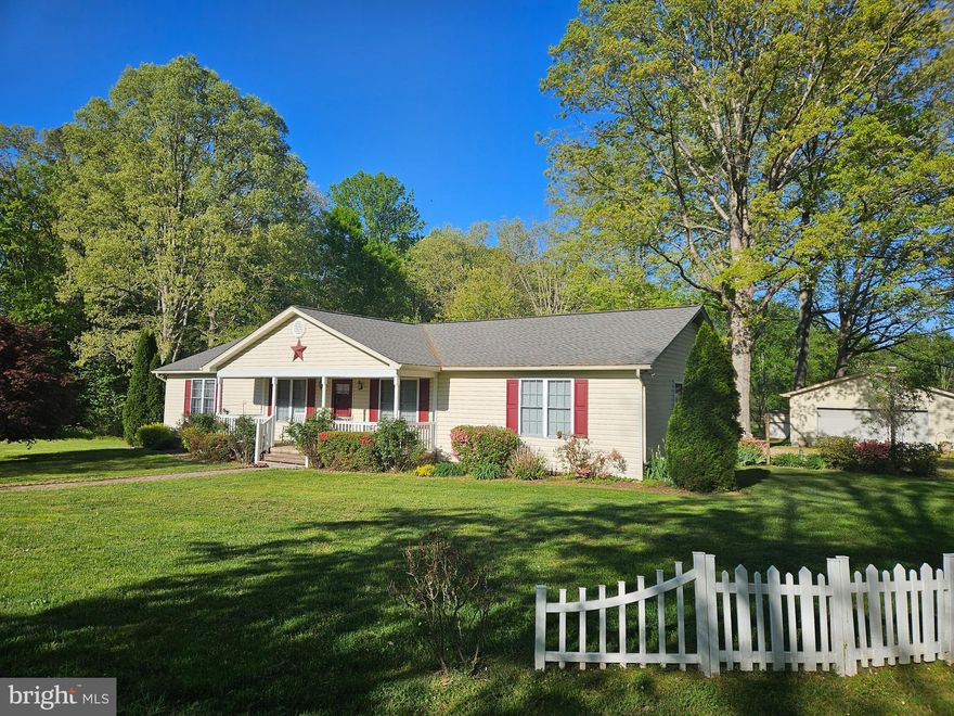 Open acreage, wooded acreage, barn, out buildings, garage, carports, screened porch, extra refrigerator, free standing fireplace with brick hearth and gas logs, deck, garage door opener. Fields are rented for hay. Double closet in main BR, with luxury bath. Split BR Design. Laundry room. Formal LR, DR. Lots of counter space and cabinets. Range, dishwasher, washer, dryer, air fryer, water cooler. No pets, no smoking allowed on the premises.