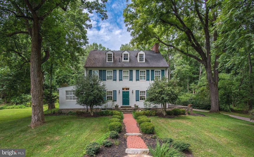 Encompassing nearly 70 acres, Dellabrooke Farm is an historic storybook destination surrounded by lush fields, mature trees, and scenic treasures dating back to 1817. Tucked away but just minutes from charming Olney, Dellabrooke Farm has privacy and tranquil exclusivity. The grounds include a renovated 5BR/3.5BA Main House, a renovated 1BR/1BA Guest Cottage, as well as a Barn, all set amongst bucolic pastures and woodlands. Approximately 59 acres of the property are in a woodland conservation area, keeping taxes low and allowing you to live in your own nature preserve! MAIN HOUSE (approximately 3161 finished SF and a 1415 SF cellar): The Main House is an expanded Quaker Farmhouse that invites you to explore its charming four finished levels. Classic millwork, rich hardwoods and generously sized rooms are just a few of the timeless features that define this wonderful residence. There are 5 Bedrooms and 3 Full Baths on the Upper 2 Levels. There is an unfinished Cellar that can be used as a Workshop, Storage Room, or Home Gym. GUEST COTTAGE (approximately 1451 finished SF): The Guest Cottage is a lovely feature of this property, offering a separate retreat with rustic architectural details. The Great Room is dressed in stone and warmed by a wood stove. Reclaimed wood lines the cathedral ceiling and large windows wash the room with natural light. In addition to the Full Eat-in Kitchen with stainless steel appliances and granite counters, there is a large back room that is ideal as a Home Office, Craft Room, or Playroom. The Upper Level Bedroom has a vaulted ceiling and great closet space. There is a Full Bath on the Main Level. BARN: Stone walls line the yard of the expansive Barn that is now used as a Workshop and Garage. With electric, heat, and water supplied to this building, this incredible space can be suited to nearly every lifestyle. A craftsman's dream space, a car lover's haven, a fitness fanatic's home gym - the possibilities are endless!!