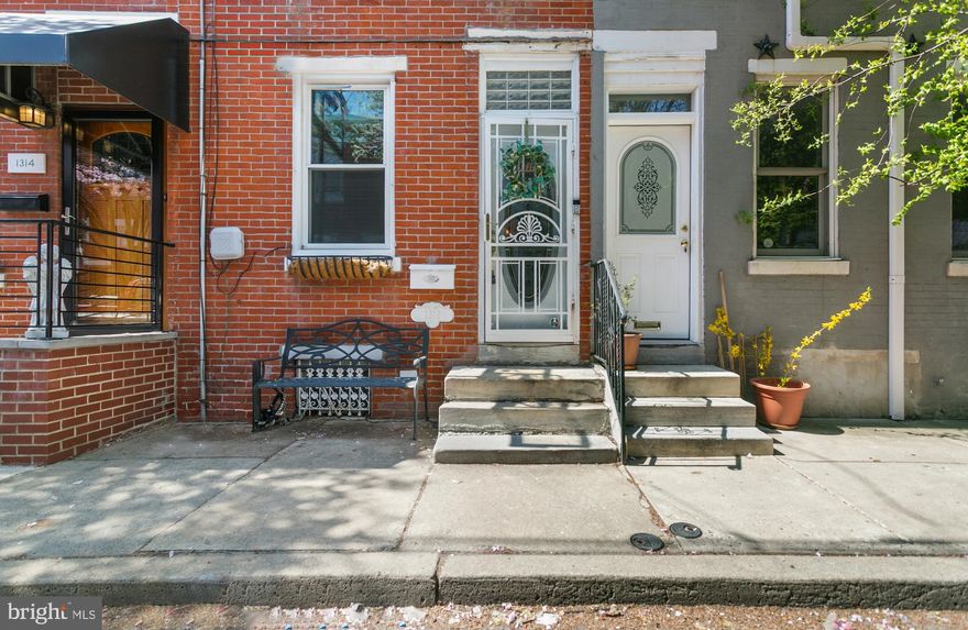 ***OPEN HOUSE! Sunday 4/12/26 from 12pm to 2pm*** Welcome Home to 1312 S Alder Street! This charming home is located in the heart of Passyunk Square —one of Philadelphia’s most loved neighborhoods. Offering 1,138 square feet of living space, this home blends comfort, character, and an unbeatable location. As you enter, you will find an open-concept and a modern aesthetic. The spacious living room features gorgeous, solid hardwood flooring. This room is large enough to put a dining table as well, should you so desire. The updated kitchen boasts ample cabinetry, a stainless steel oven and refrigerator and a large island with lots of seating and additional counter space.  Off the kitchen, you will find your private yard — perfect for grilling, relaxing, enjoying a good book or sipping on your favorite beverage... the choice is yours! Upstairs you will find more stunning hardwood floors, two generously sized bedrooms, and an expanded full bath. Additionally, you will find the convenience of a large walk-in closet in the hallway. This home was originally a three bedroom and was converted to a two bedroom in the past. Therefore, the bathroom is more spacious, and the additional walk-in closet is a huge bonus. The full basement has a newer washer and dryer and all the storage space you will ever need. And talk about LOCATION, LOCATION, LOCATION! 1312 S Alder Street is steps away from some of the absolute best the city of Philadelphia offers including but not limited to the vibrant and popular East Passyunk Avenue, amazing restaurants including the historic Victor Cafe, Stogie Joe's Tavern, Cantina Los Cabillitos, Ember and Ash and Barcelona Wine Bar, just to name a few. You will be just steps away from two of the city's most famous steak shops — Pat's and Geno's. You can also take a walk to Philadelphia's amazing Italian Market. Additionally, Columbus Square Park is just a short stroll away, allowing a nearby retreat for your furry friends. This home is an incredible opportunity to own a turn-key residence at an affordable price and be surrounded by some of the best that the city has to offer! Don't wait... schedule your showing today and make 1312 S Alder Street your new Home SWEET Home! ***Virtual Tour Available!***
