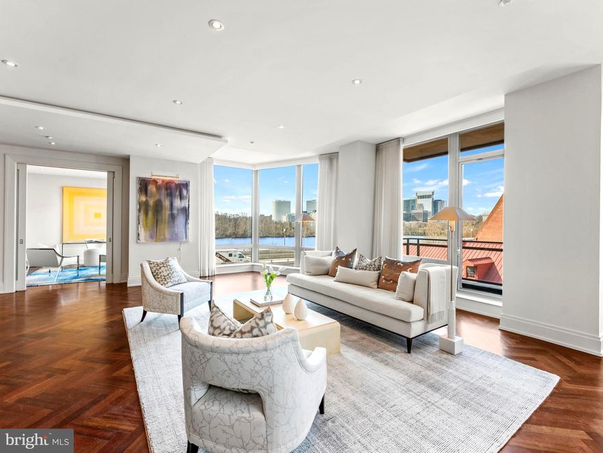 Elegance | Location l Amenities  - The Georgetown Ritz Carlton One level living. 3400+/-SF floor plan w/ gracious entertaining flow throughout principal rooms with  stunning Potomac/Key Bridge vistas. Gracious entry foyer. Library with exquisite built-ins. Kitchen with attached Breakfast Room. Elegant owners suite and owners bath has heated floors and a steam shower 3 more bedrooms with En-Suite full baths.  The 4th bedroom is currently used as a home office with River views! .  Half bath in entry foyer.. Custom built-ins.  Bar area with extra beverage refrigerator and ice maker.  2 Car Garage Parking. Endless amenities & service in the Georgetown Ritz. Fitness center, 24 hour front desk, security, valet, steps to the waterfront park and the jogging/bike paths  all located in downtown Georgetown with convenient access to all the popular restaurants