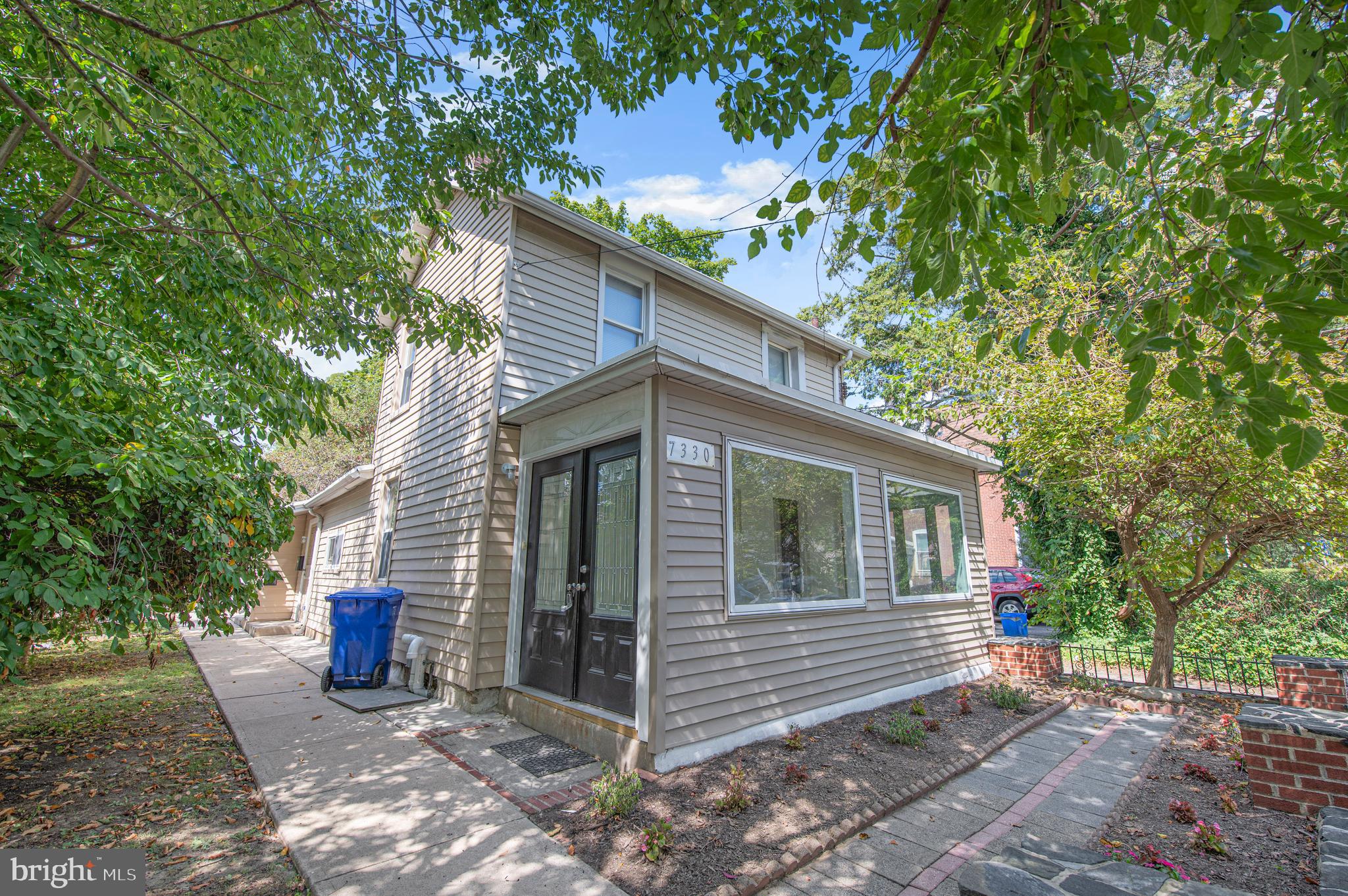 Home sweet home! This charming duplex property is a perfect addition to your portfolio or a new place to call home. Featuring a welcoming enclosed front porch with ample living space, this property is sure to be a favorite. Step through the front door into the front unit and notice the beautiful flooring and kitchen, which boasts abundant cabinetry. Towards the rear, you'll find your laundry area, half bath, and a cozy outdoor paved space and yard perfect for relaxation. The second floor offers three generously sized bedrooms, as well as a full bathroom. The rear unit is complete with 2 bedrooms, Full bathroom and living space. This property is quite unique. Conveniently located near a variety of restaurants, stores, and more, this property is a must-see. Add it to your list and book your appointment today!
