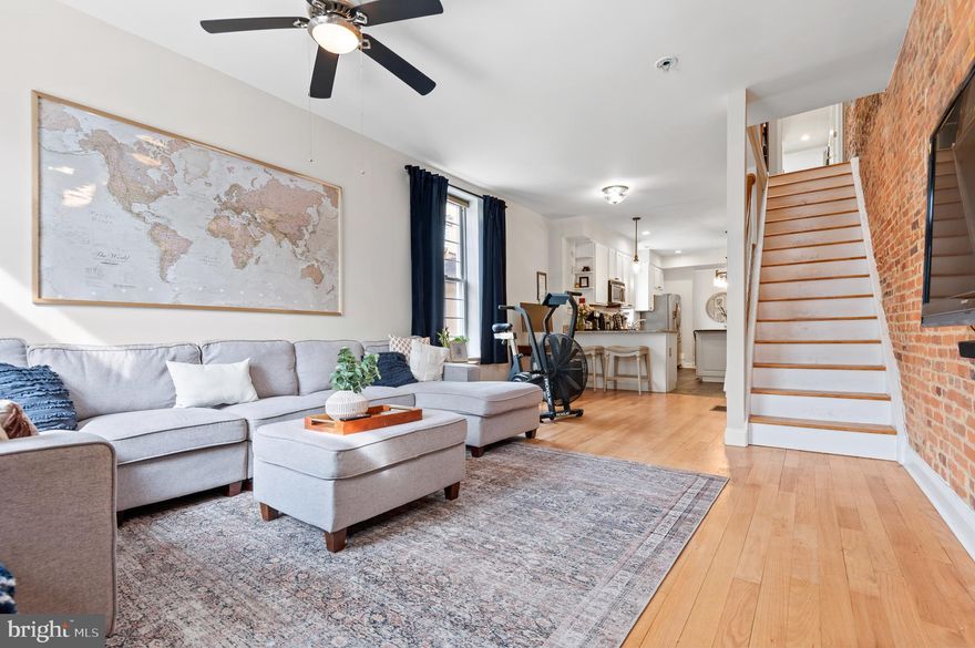 **Luxury & Light Filled End Unit Townhome right at Canton Square & 2 blocks from the water front!  Attached oversized 1 car garage with entry into separate dining area!  Garage fits full size SUV with space for bicycles too.  Open floor plan!  Gourmet kitchen with granite counters, stainless steel appliances a center island and breakfast bar! 9 foot ceilings on main level & cathedral in master bedroom!  Master bedroom opens to balcony and stairs to rooftop Trex deck! Exposed brick walls in living room & upstairs hallway!  Spa bathrooms on upper level; both with double sinks; also a jacuzzi tub, double shower, ceramic floor & surround tiles and European cabinetry! High quality designer carpet in bedrooms. Whole house was professionally painted in light grey with white trim! Beautiful hardwood floors in living & dining room were refinished; look immaculate!  Kitchen has slate tile floors!  Trex deck off 2nd bedroom and rooftop deck!  Lots of available on street parking; generous spots!  Walk all around Canton & the water front park & promenade!  Great Historic Canton Square & water front restaurants.  Marina within walking distance too; 3 blocks! Ferry is located 2 blocks down to the water! Grocery stores just around the corner.  Finished basement with full bathroom!**