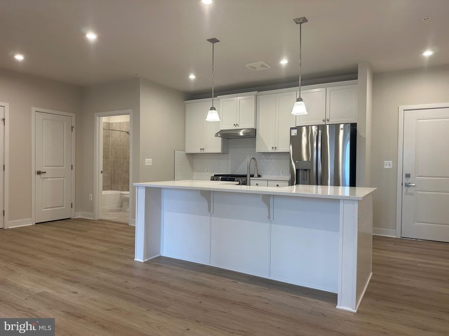 Brand New 2 Bedroom 2 Bath Condo For Rent In The Ellipse at Westfields! Bright Open Floorplan with over 1100sq and Hard Surface Wide Plank Flooring Throughout. Gourmet Kitchen w/Tons of Cabinet Space, Quartz Countertops and Huge Island. Primary Suite w/Attached Primary Bath with Roll in shower and Walk In Closet. Ample 2nd Bedroom with Full Hall Bath. Walk Out to Private Balcony. Secure Building with Private Gated Garage. One Garage Spot Plus Parking In Front of Building Great Location.

Ellipse at Westfields boasts a prime location in the Westfields area of Chantilly, close to some of the best shopping, dining, and recreation the area has to offer! • Direct access to Rte. 28, and minutes to Rte. 50, I-66 and Rte. 267 • Walking distance to The nZone with turf fields, courts, a gym and multiple classes • Under 1 mile to Chantilly Crossing shopping center with Target, Costco, Tous Les Jours Bakery and Chipotle • 1 mile to Chick-fil-A, Starbucks, Tropical Smoothie Cafe, Walmart and the Dulles Expo Center • 1.5 miles to Westfields High School - Go Bulldogs! • 2.5 miles to Sully Plaza with Aldi, At Home, and Lowe's • 2.5 miles to The Field at Commonwealth Shopping Center with Wegmans, Crumbl Cookies, Lazy Dog Restaurant and Bar, CAVA, Mellow Mushroom and more • 2.5 miles to Flatlick Stream Valley Park with paths, creeks and ponds for fishing • 3.5 miles to Chantilly National Golf & Country Club • 3.5 miles to Ellanor C. Lawrence Park with trails, athletic fields, and picnic areas • 15 minutes to Dulles International Airport • 15 minutes to Herndon and Reston