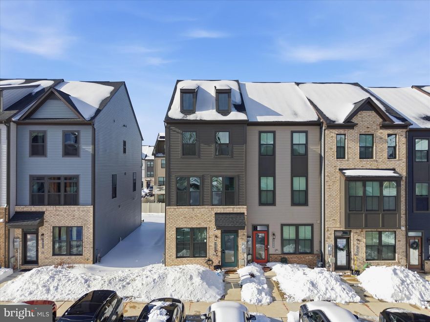 Never has convenient townhome living felt so luxurious. Welcome to the Clarendon model at 7810 Yona Court, where thoughtful design and upscale finishes come together to create a home that truly fits your lifestyle. Enter on the lower level to a versatile recreation room—ideal for a home office, media space, or guest retreat. Ascend to the main level and be greeted by a bright, open, and light-filled floor plan that feels far more spacious than expected. The gourmet kitchen anchors the home with warmth and functionality, seamlessly connecting to the dining area—perfect for everyday living and entertaining alike. A generously sized family room offers flexible furnishing options, while additional closets and a conveniently tucked-away powder room enhance everyday ease. Step outside to the extended deck, bringing outdoor living right to your doorstep. Upstairs, the sense of space continues with a wide hallway foyer. The primary suite is a true retreat, featuring spa-like finishes including a walk-in shower, dual-sink vanity, and an expansive walk-in closet. A second bedroom also boasts its own private en-suite bath, ideal for guests or family members.
Located in the highly desirable Tanyard Shores Townhomes, this community is perfectly situated between Route 10, Route 100, I-97, and I-695, offering effortless access to shopping, dining, entertainment, parks, and marinas—while still maintaining a peaceful neighborhood feel on the Marley Neck Peninsula. With shopping malls, restaurants, multiple parks, and Baltimore’s Inner Harbor just 15 miles away, everything you need is right around the corner. Residents enjoy an impressive array of amenities, including a clubhouse, pool, fitness center, dog park, firepit, trails, beach, dock, and waterfront activities such as kayaking, boating, and fishing along Marley Creek. Don’t miss the opportunity to own this stunning, like-new townhome—schedule your private tour today!