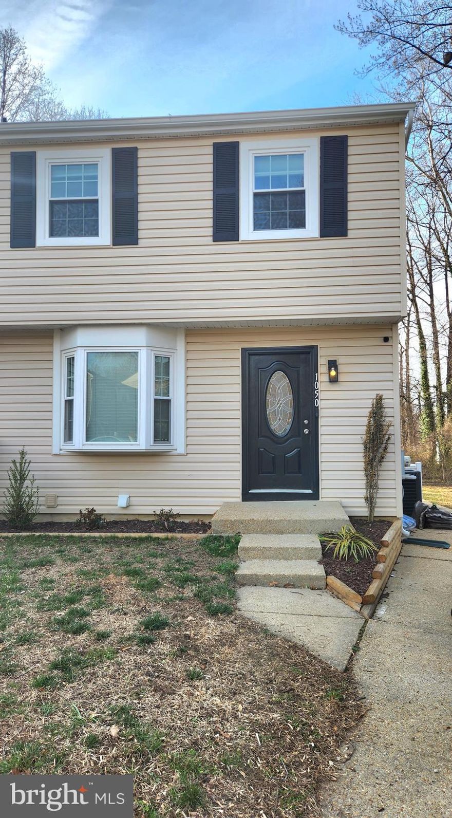 This charming end unit with a secluded spacious yard boasts updated features throughout its roomy layout. Its convenient location offers easy access to shopping, dining, Anne Arundel Community College, the Baltimore/Annapolis bike trail and the Broadneck Peninsula Trail. All new stainless steel appliances include refrigerator, stove, microwave, dishwasher, washing machine and dryer. All three levels are fully finished and freshly painted. Home features 3 bedrooms and 1.5 baths, new carpet on upper level, new hardwood floors on main level and LVP flooring in basement. New roof installed in the beginning of 2026.
Sits next to community playground for kids to enjoy. Enjoy family gatherings on large backyard deck.